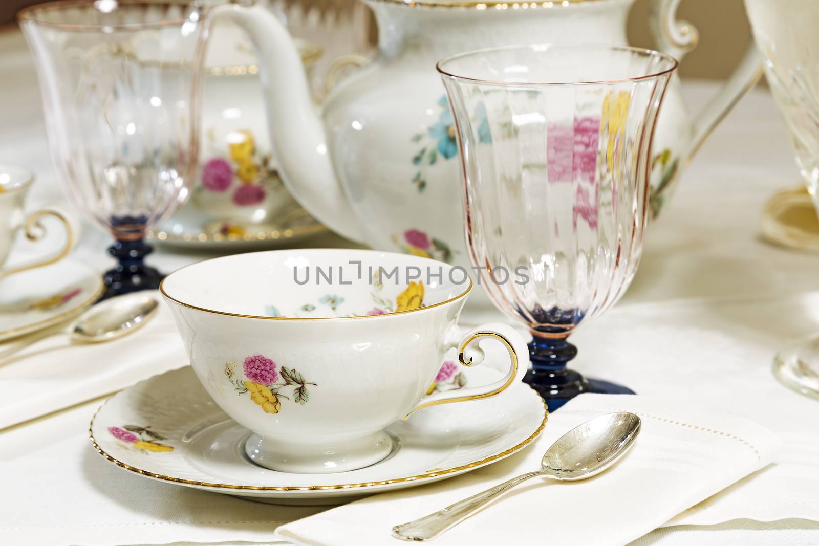 Antique floral tea set on the table