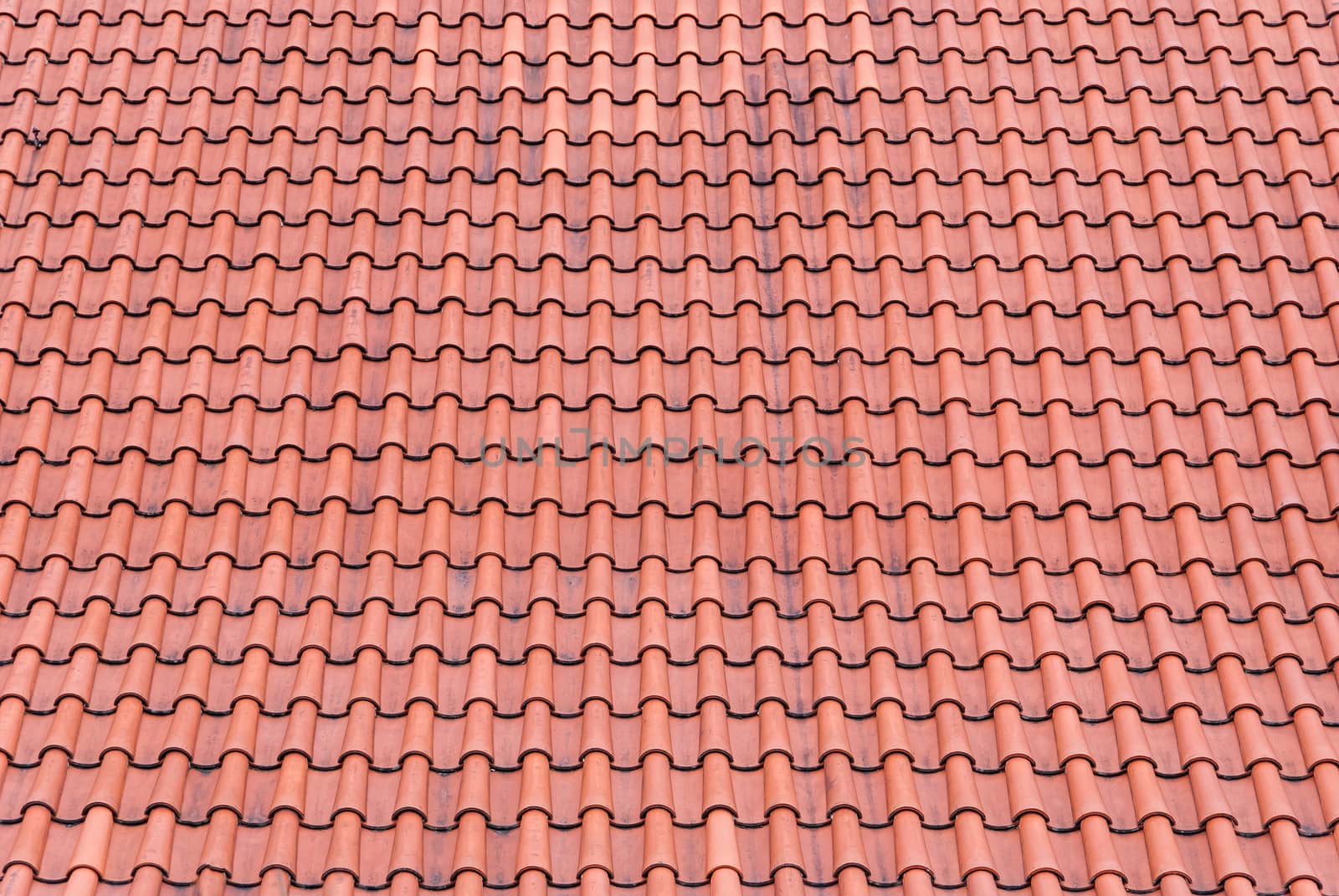 Red old tiles roof background