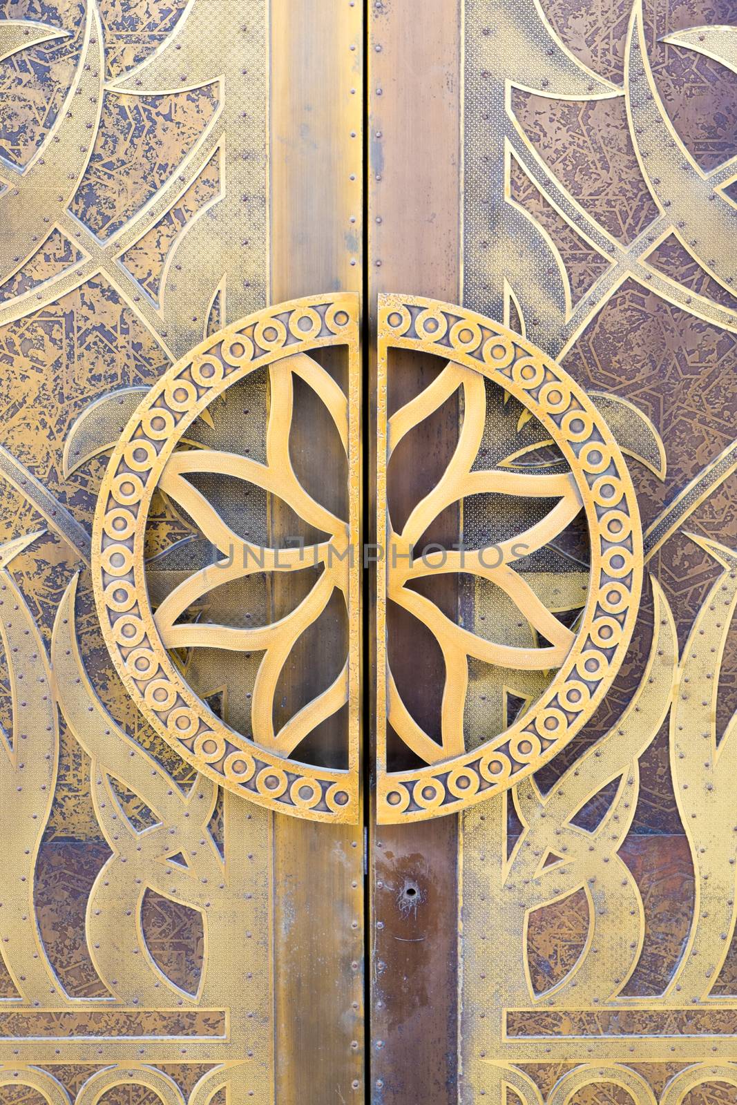 Detail of a Door to a mosque decorated with gold in Dubai.