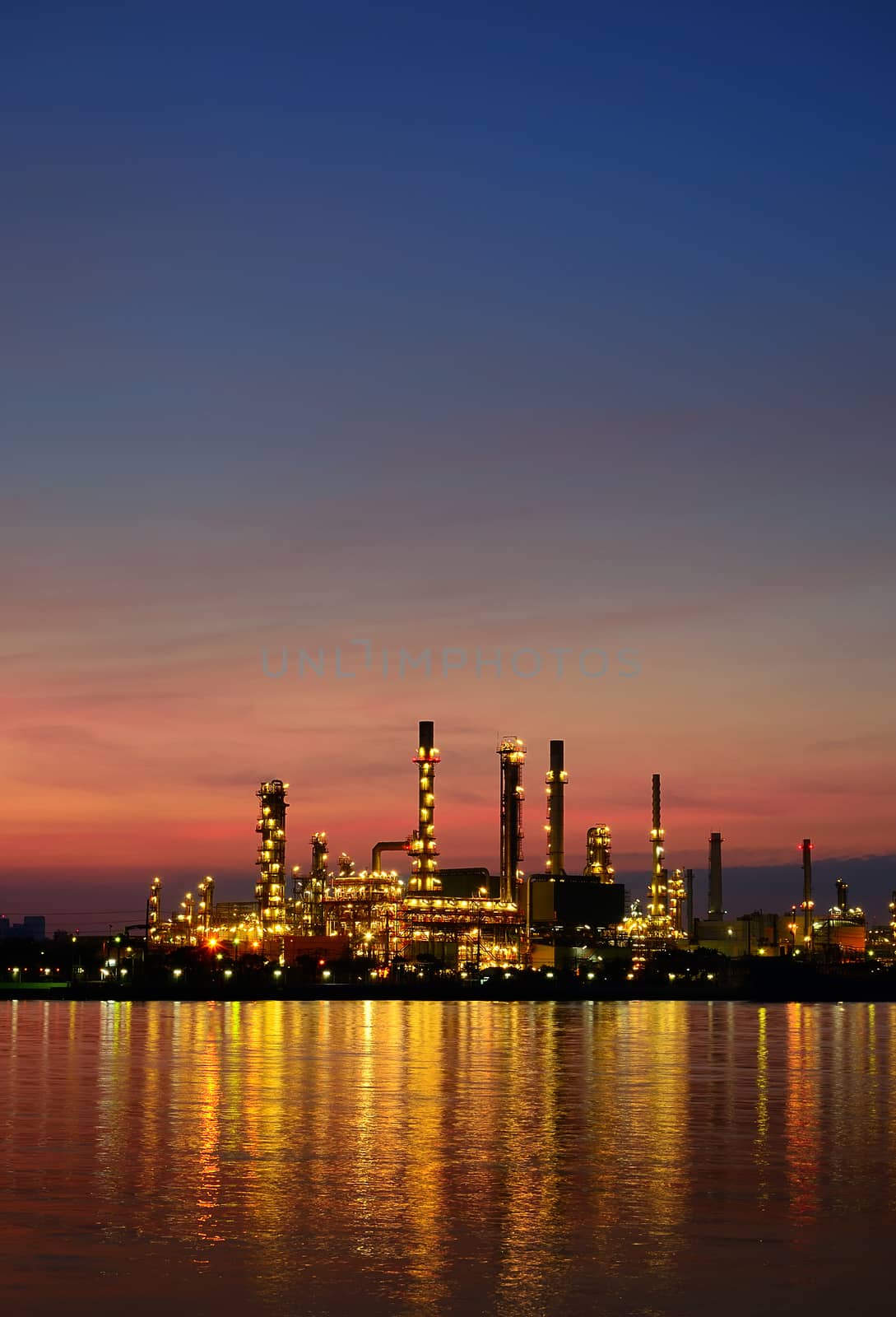 Sunrise scene of Oil refinery by pixbox77