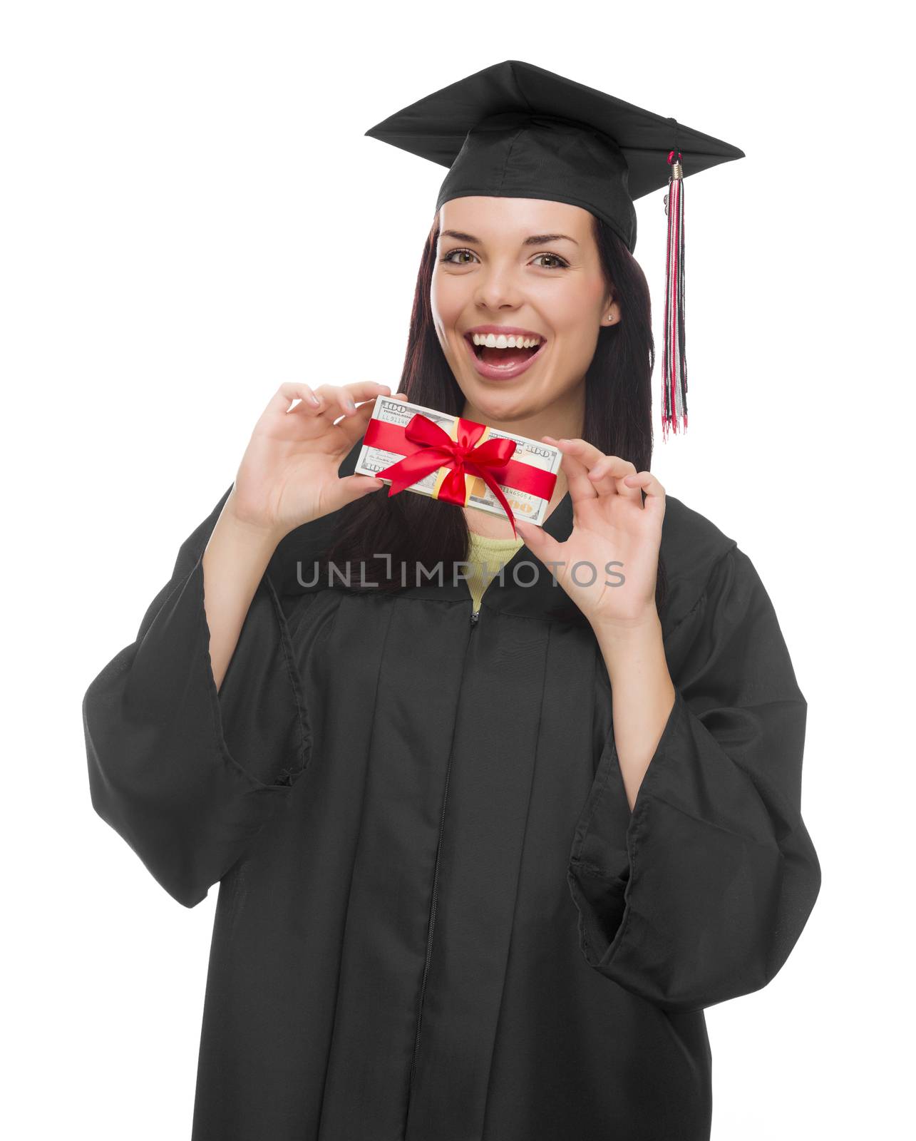 Happy Female Graduate in Cap and Gown Holding Stack of Gift Wrapped Hundred Dollar Bills Isolated on a White Background.