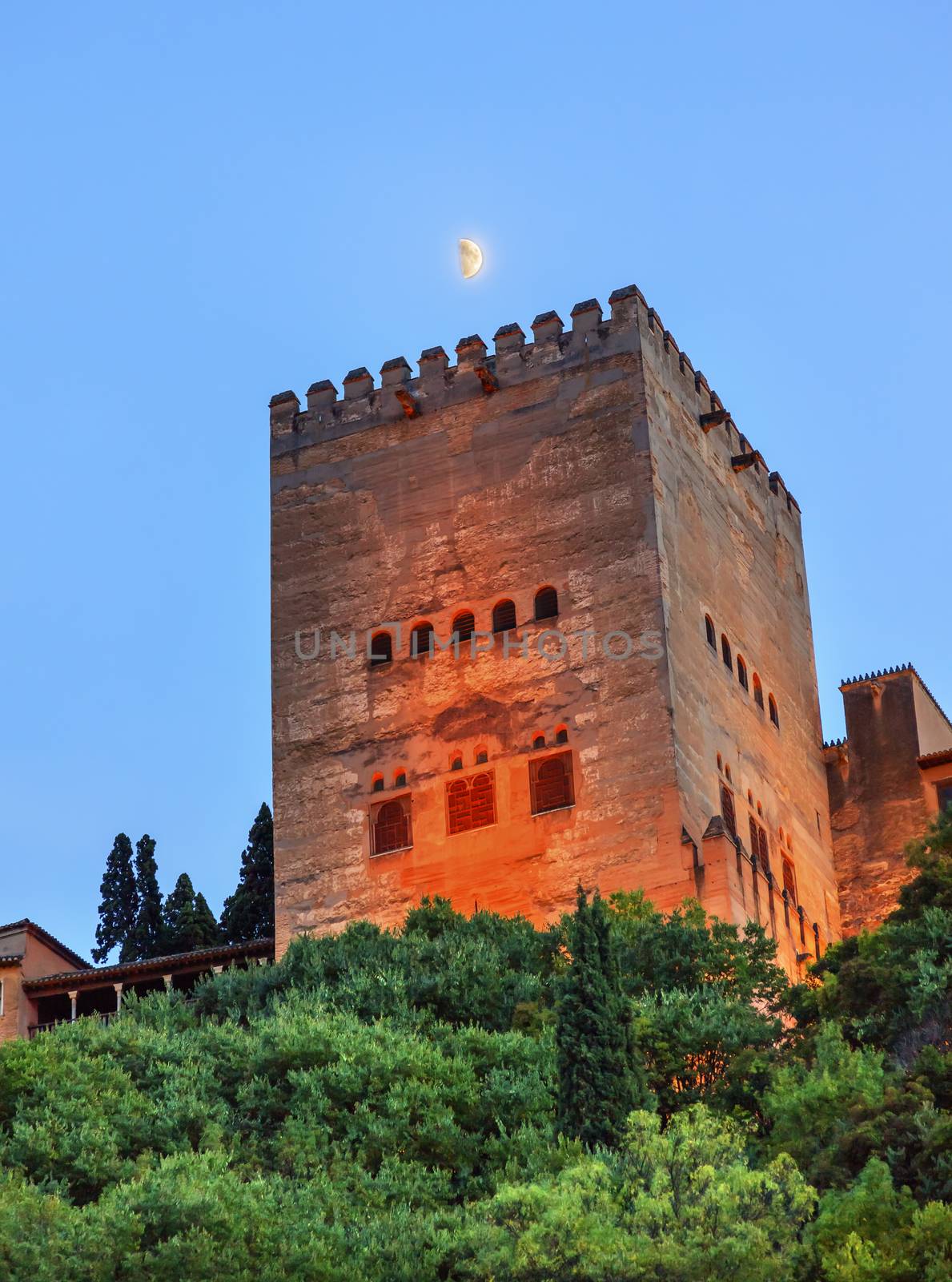 Alhambra Tower Moon from Walking Street Del Darro Albaicin Granada Andalusia Spain  