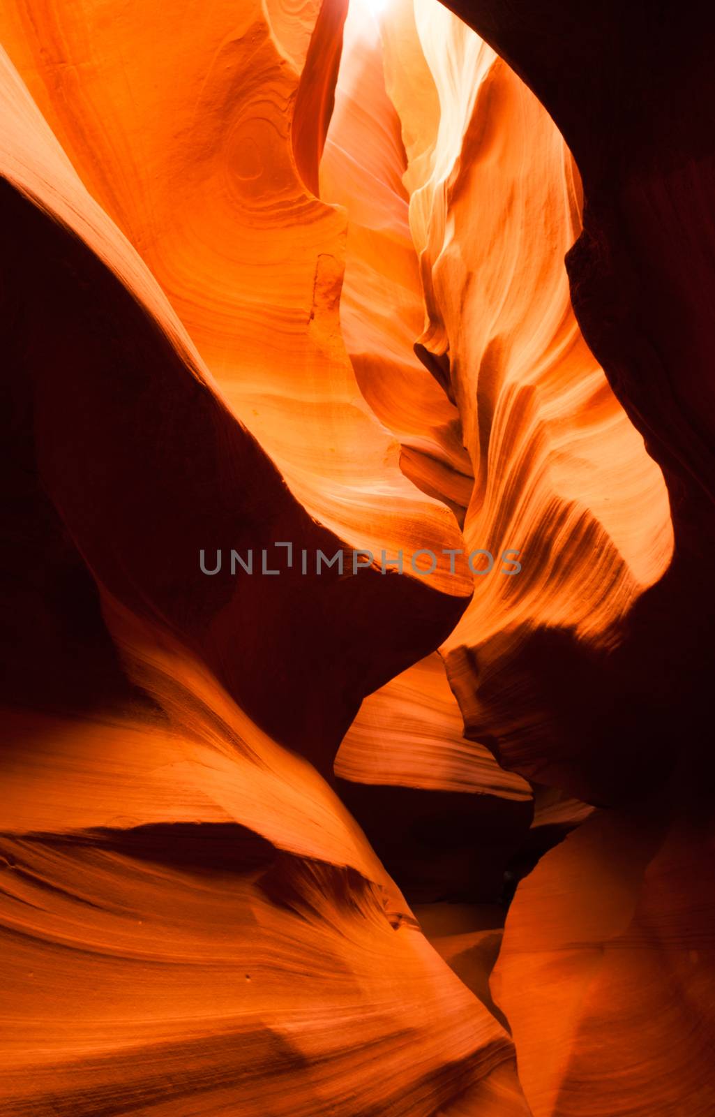 Sunlight Beams Through Crevass Sandstone Rock Antelope Slot Canyon by ChrisBoswell