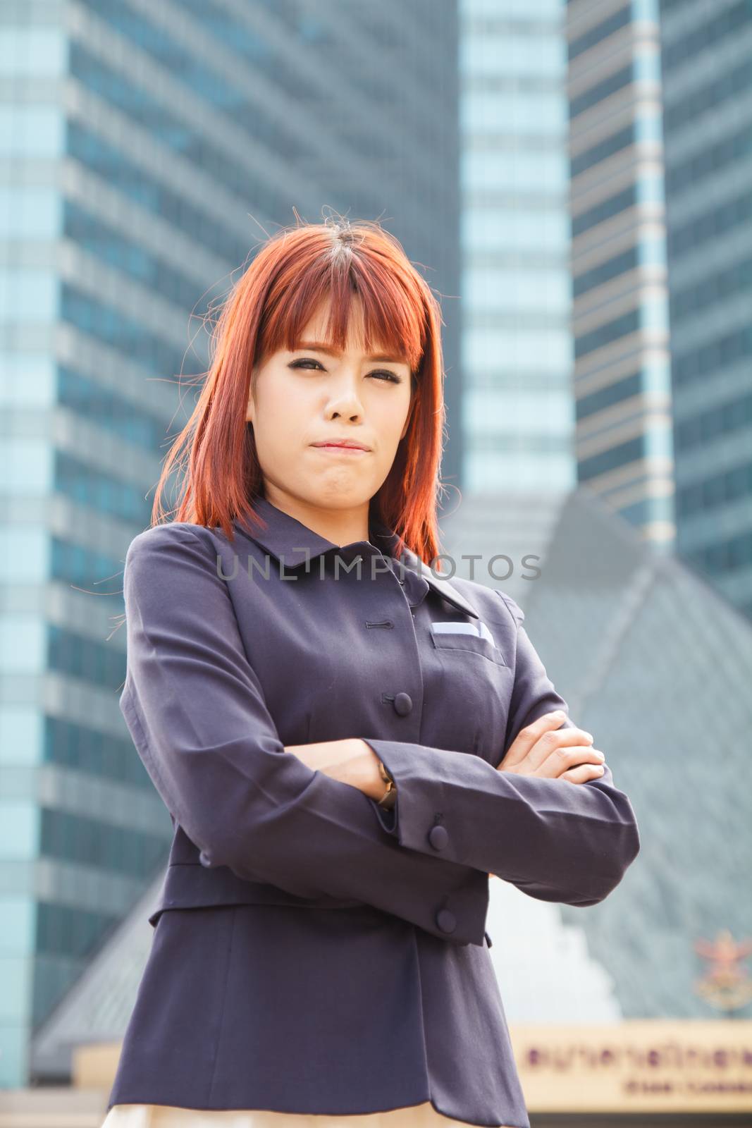 Successful business woman looking confident and smiling