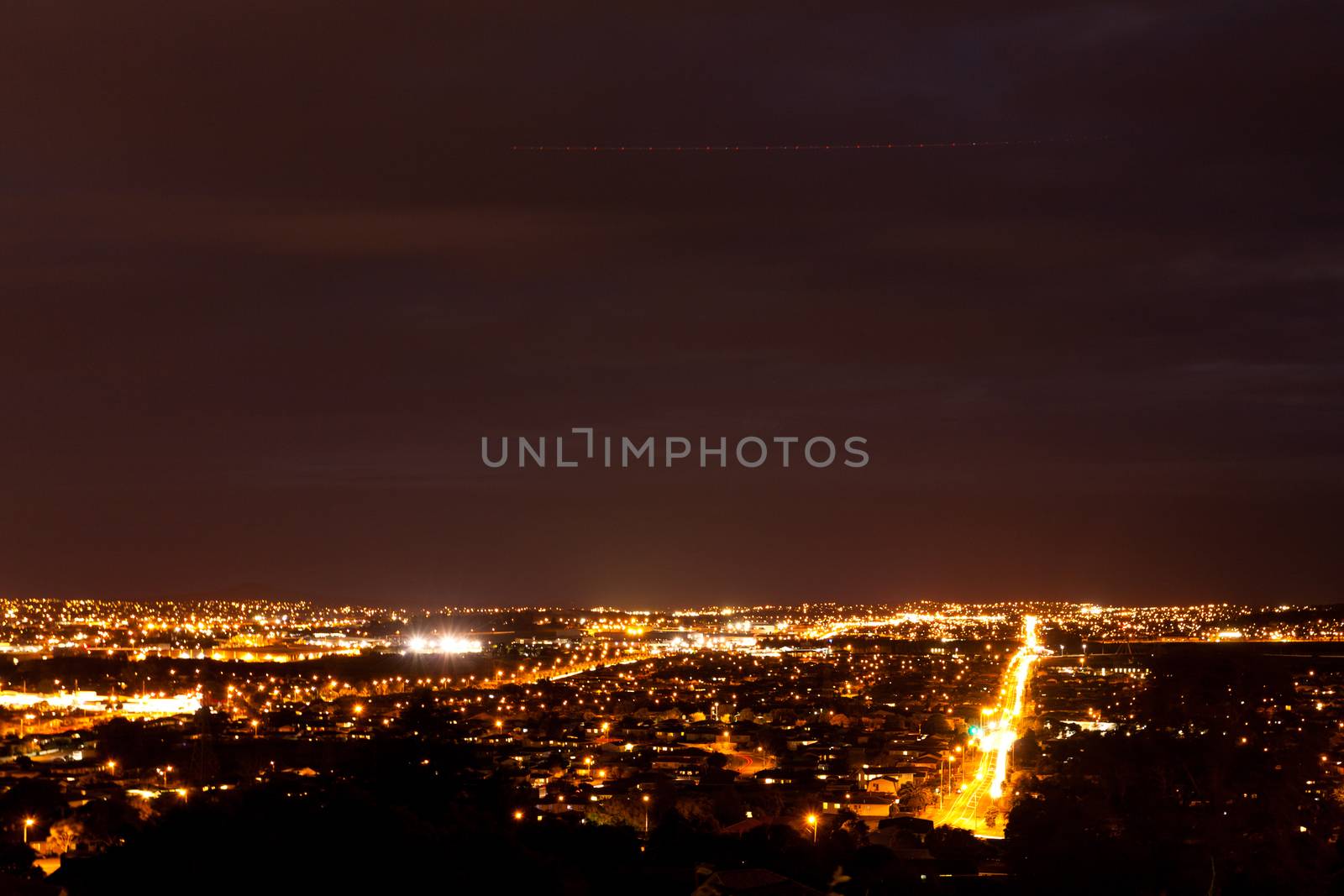 Night over illuminated Manukau, southern suburb of Auckland, New Zealand