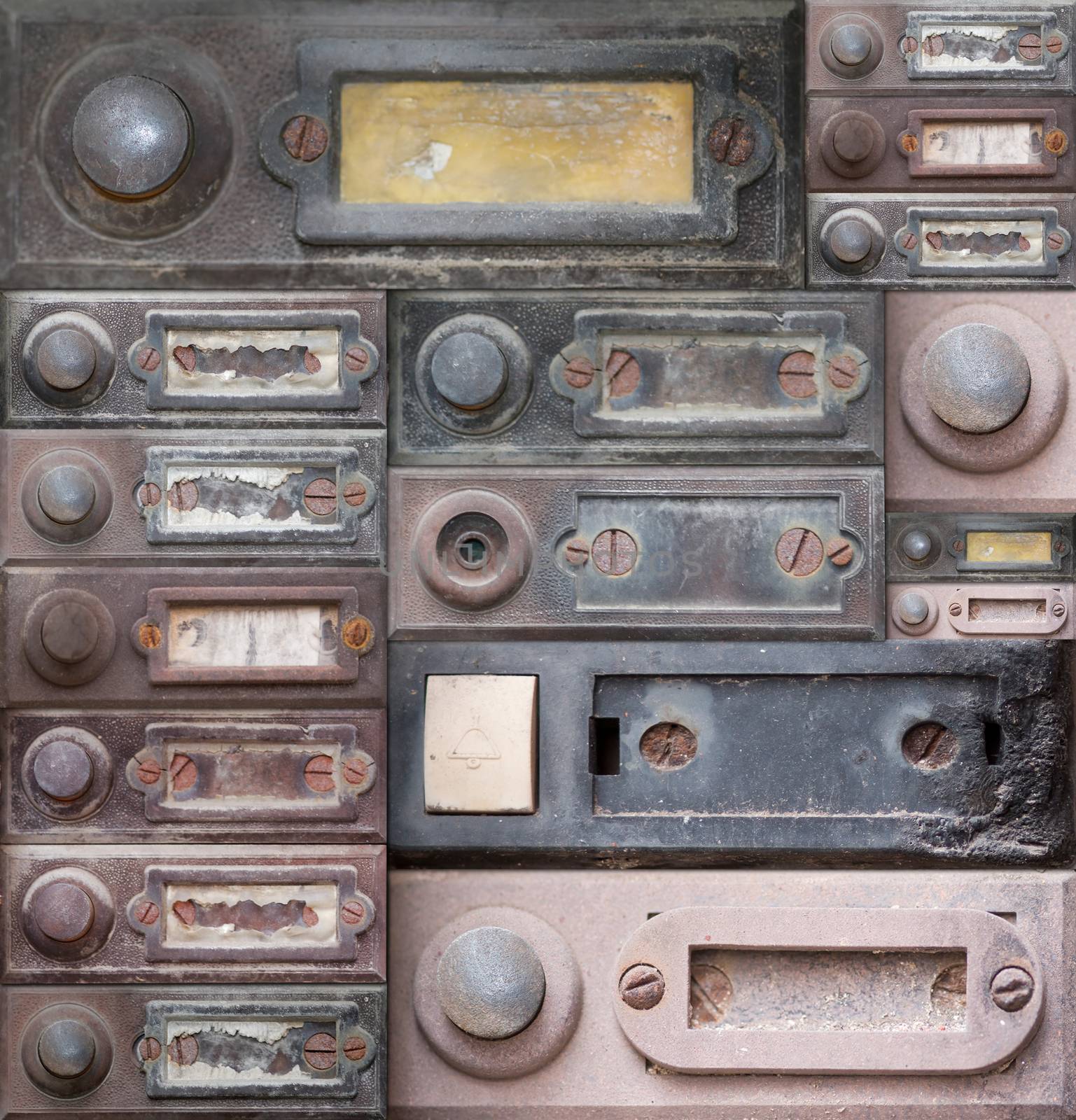 Various of the old and damaged doorbells - button