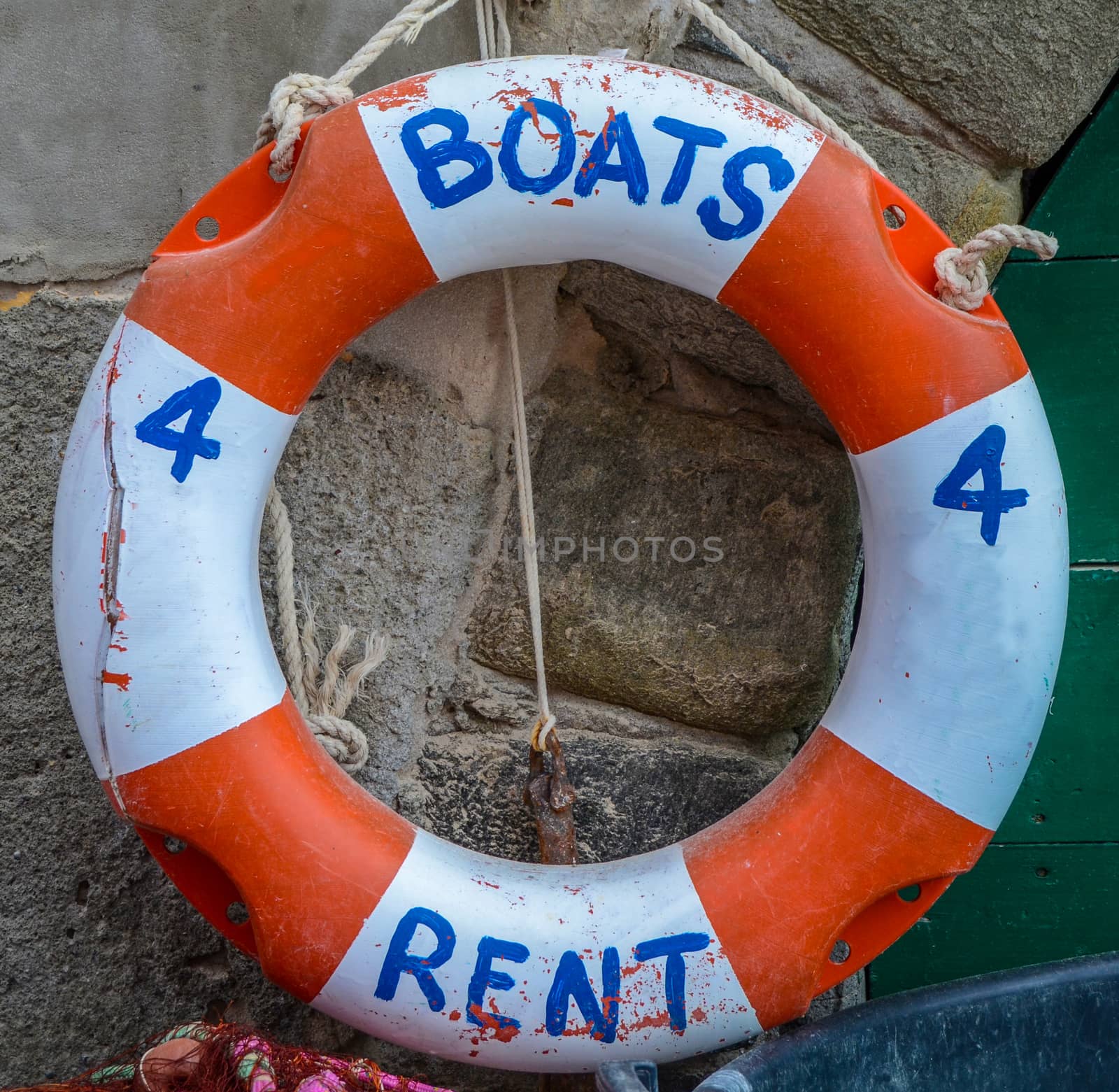 Tourism Image Of A Rustic Boats For Rent Sign On A Lifebuoy