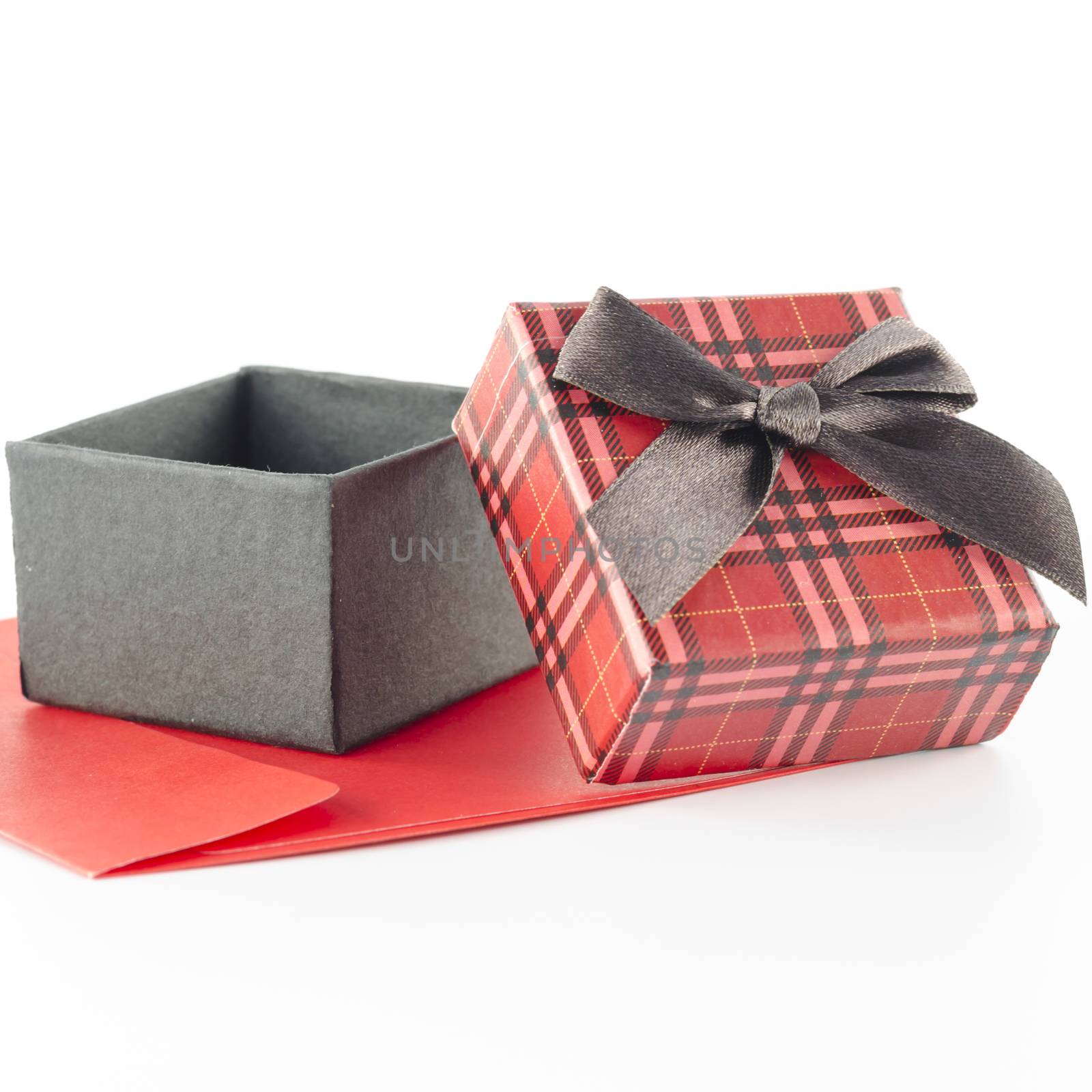 red envoloper and scotch gift box isolated on white by ammza12