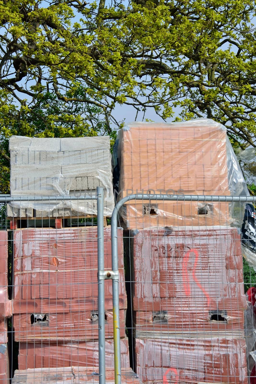 Piles of bricks on construction site