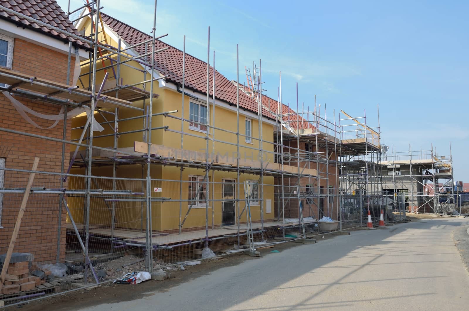 row of new houses under construction