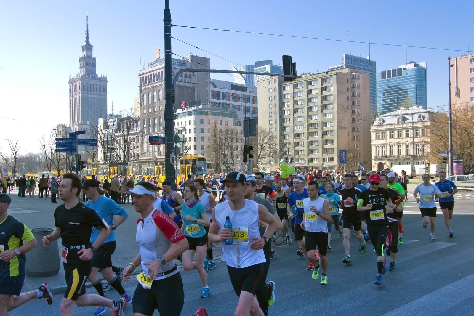 Warsaw, Poland – March  30, 2014: Participants of the 9th Warsaw Half Marathon in the city center