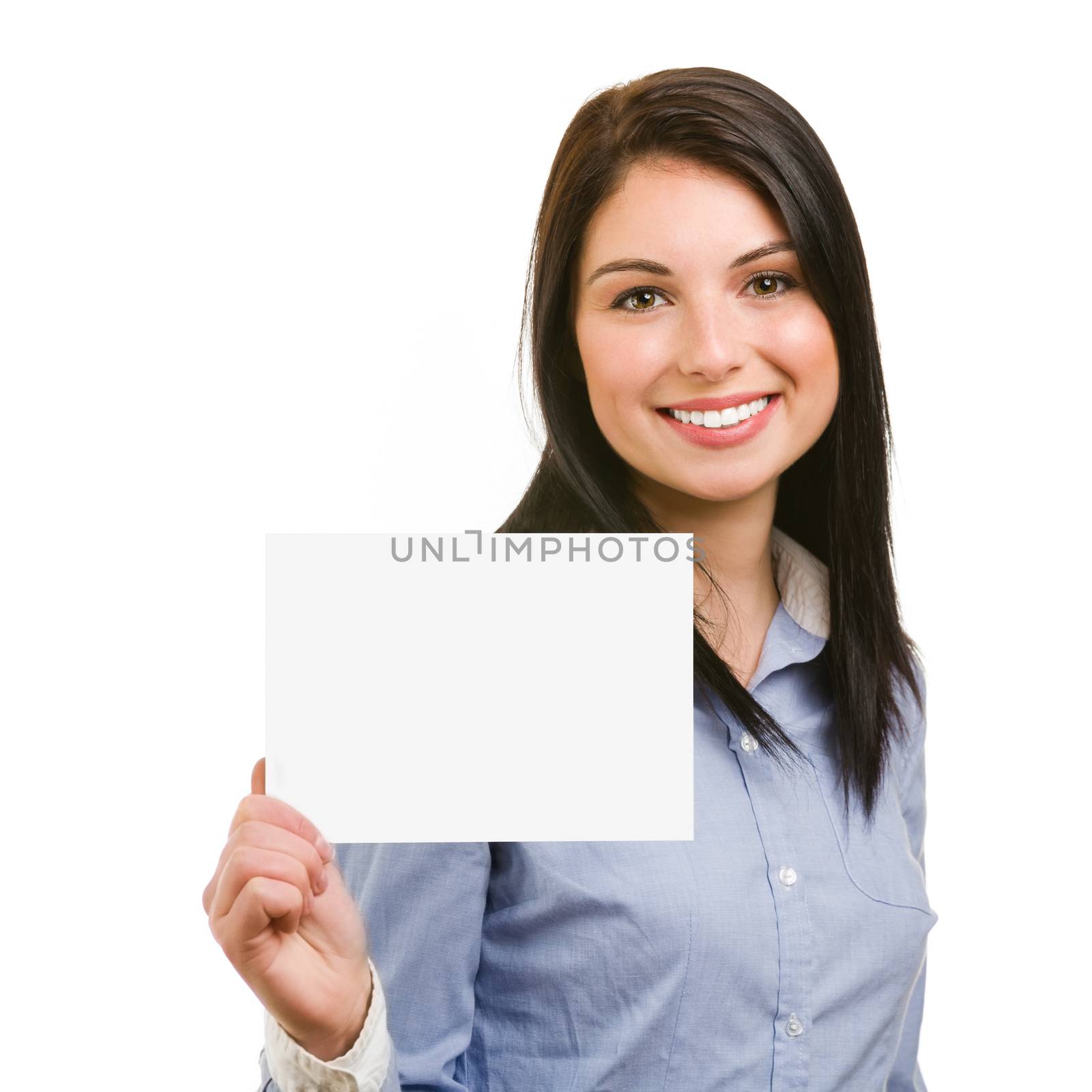 smiling young woman showing blank signboard by alessandroguerriero