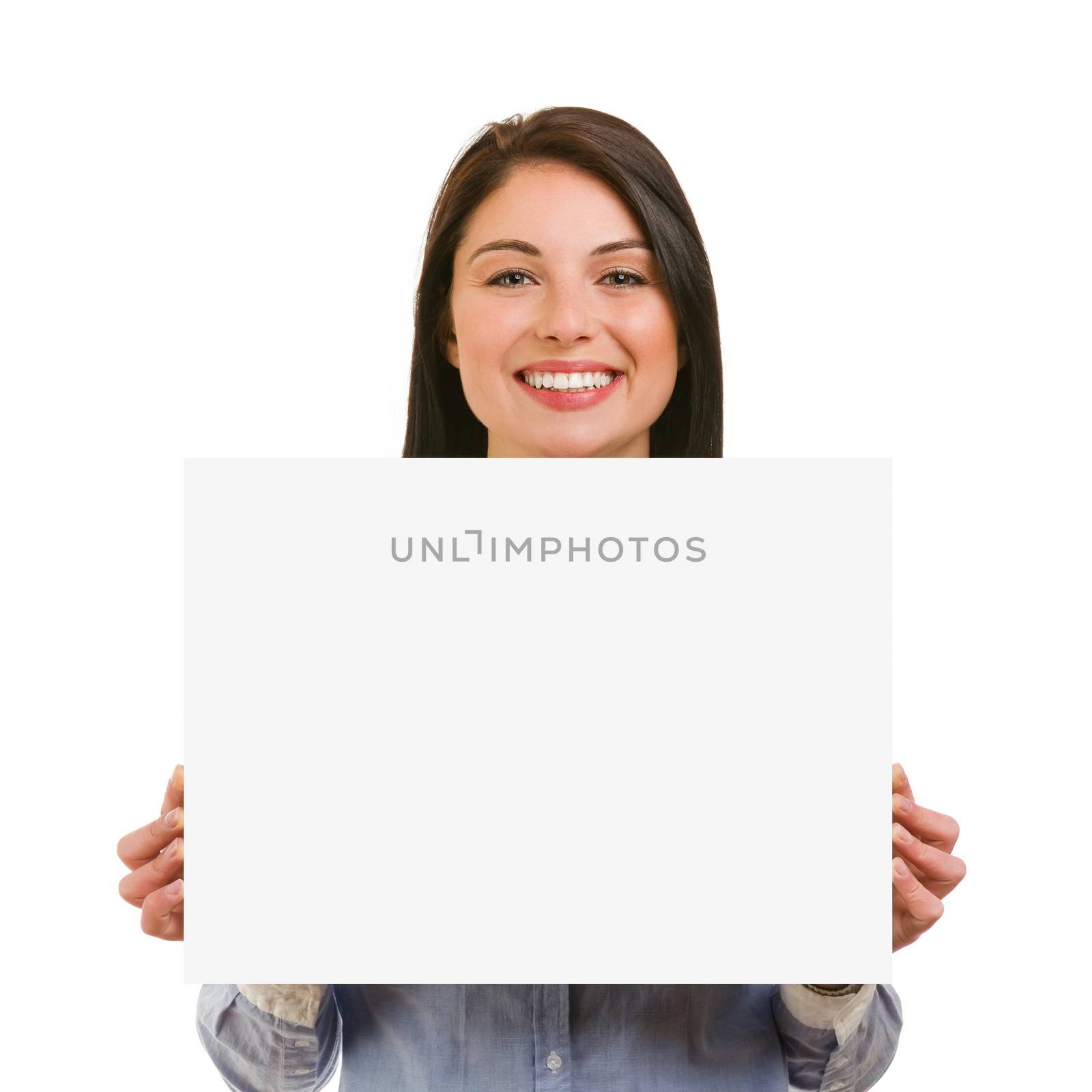 Isolated smiling young woman showing blank signboard by alessandroguerriero