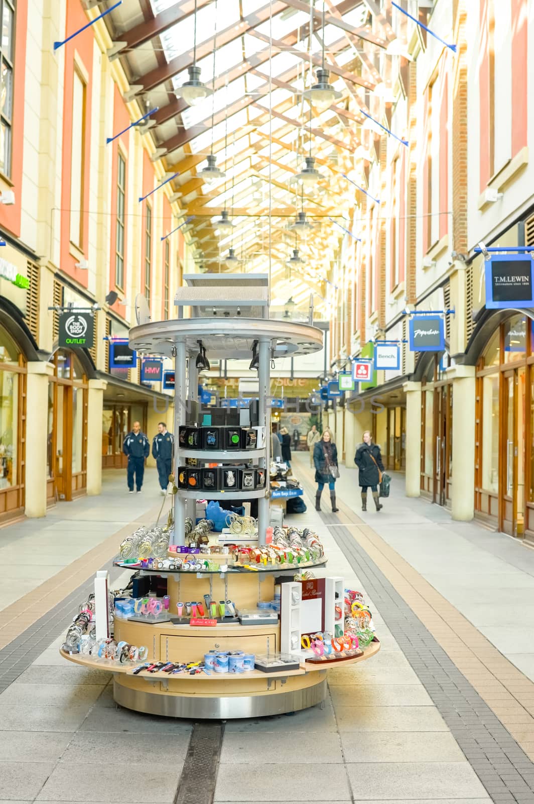 PORTSMOUTH, UK - FEBRUARY  1, 2012: Watches and trinket stall during quiet, post-christmas shopping at Gunwharfs Quay mall in Portsmouth, UK