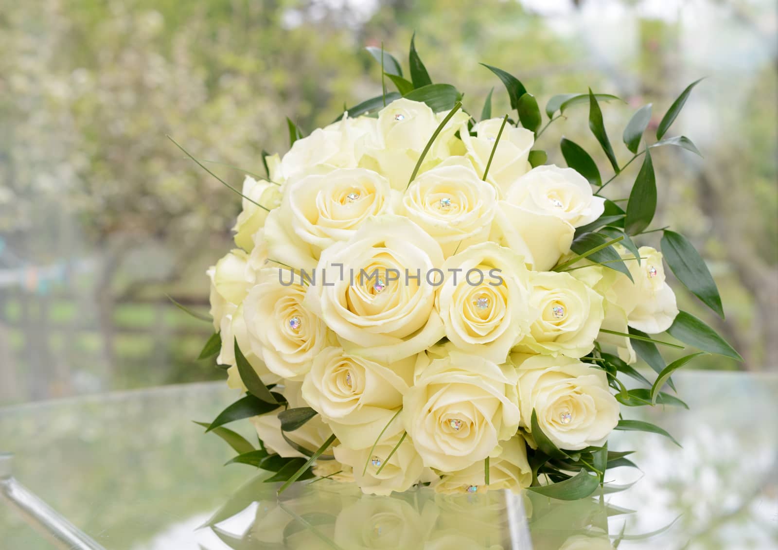 Brides bouquet of beautiful yellow roses on wedding day