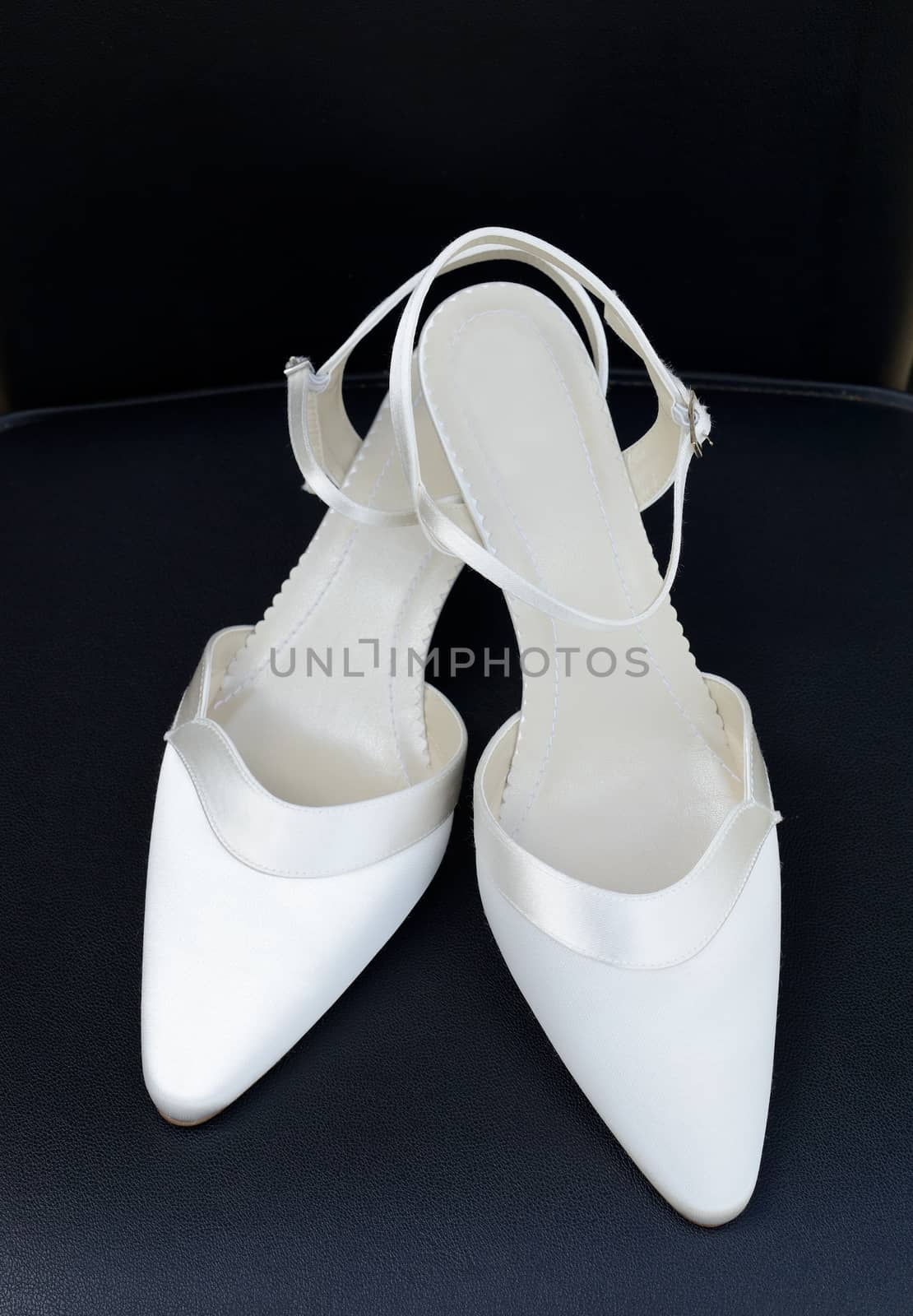 Pair of shoes for bride by kmwphotography