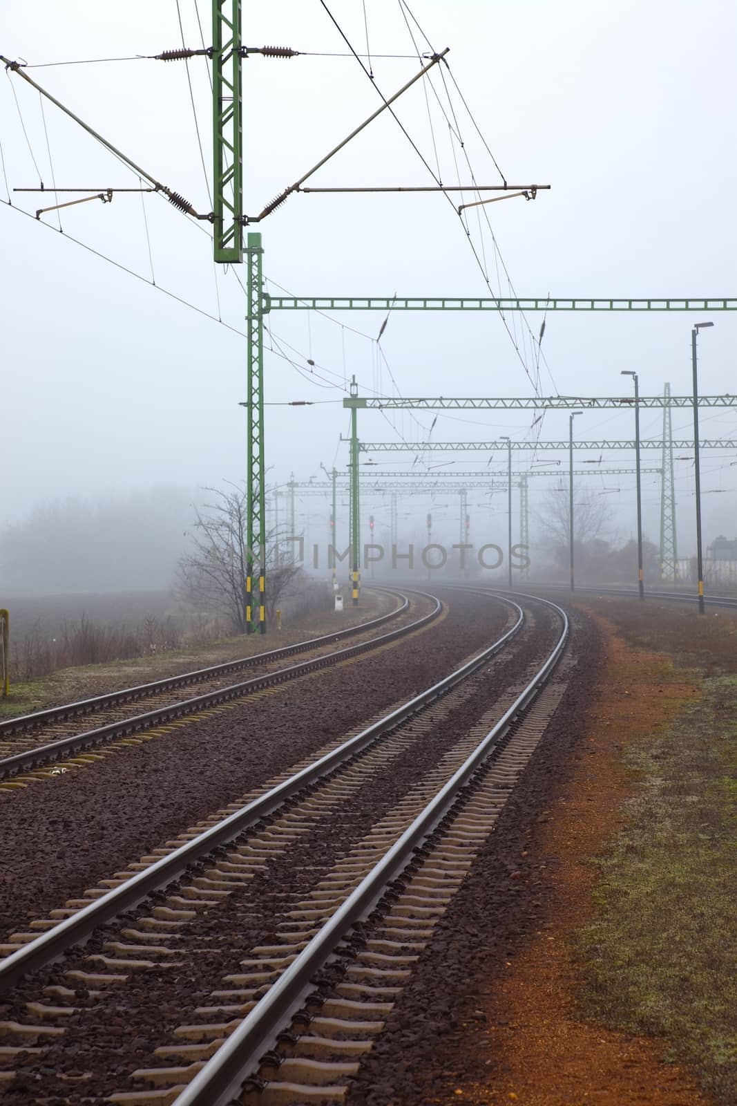 Railroad tracks in the fog