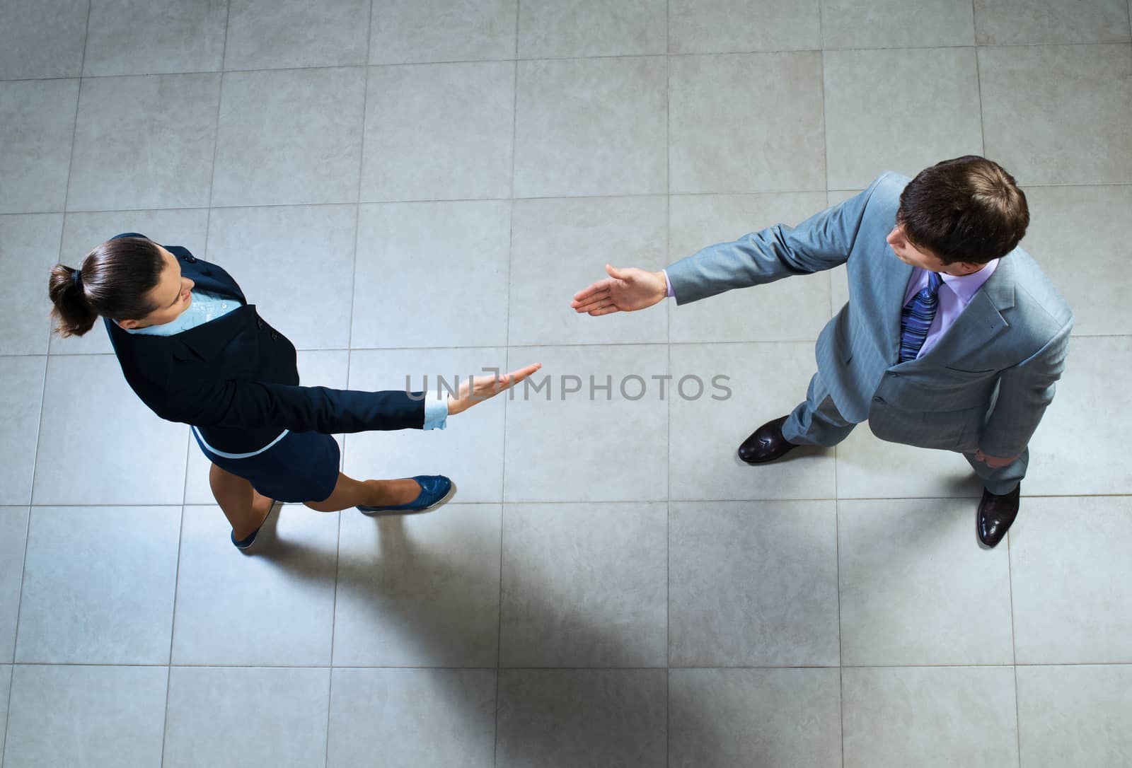 businessman pull his hands toward each other, the future handshake