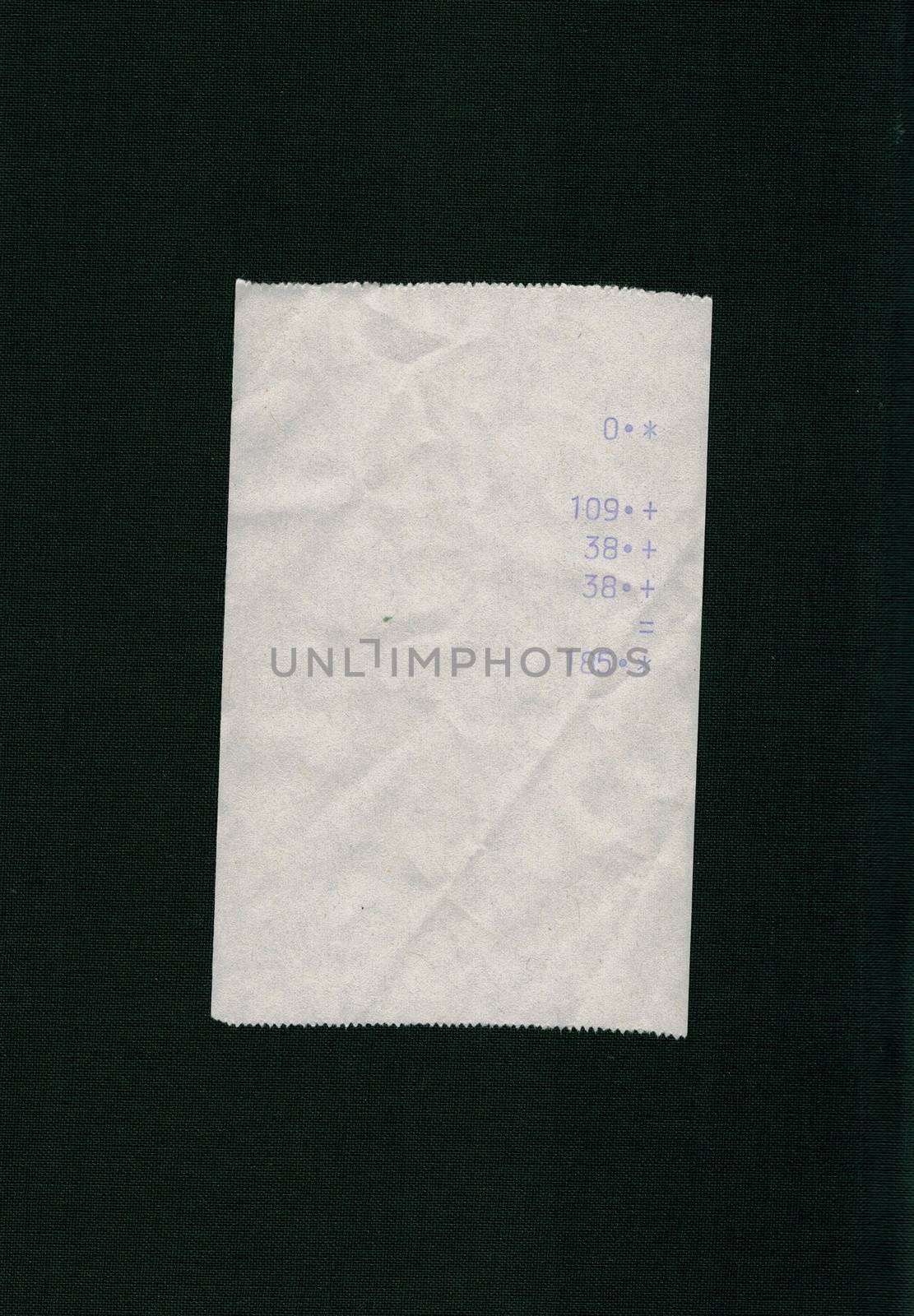 bill or receipt isolated over black background