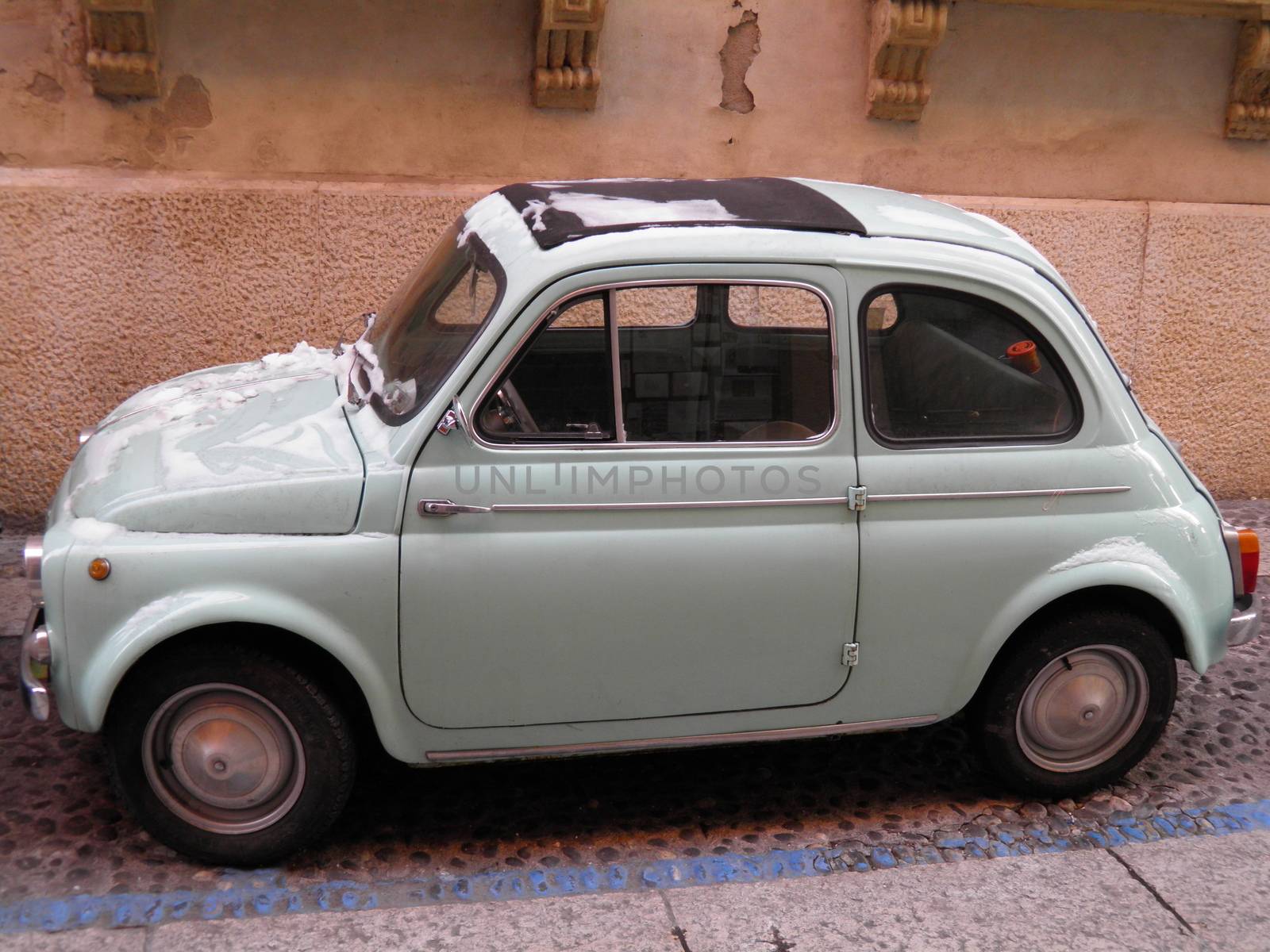 BOLOGNA, CIRCA FEBRUARY 2012 - Fiat 500 in the city centre of Bologna, circa January 2012 