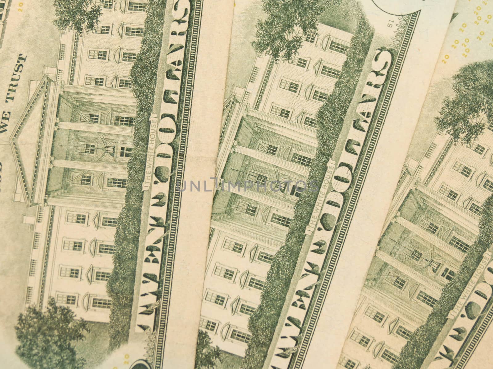 US dollar banknotes - twenty-dollar bill featuring the White House on the back side