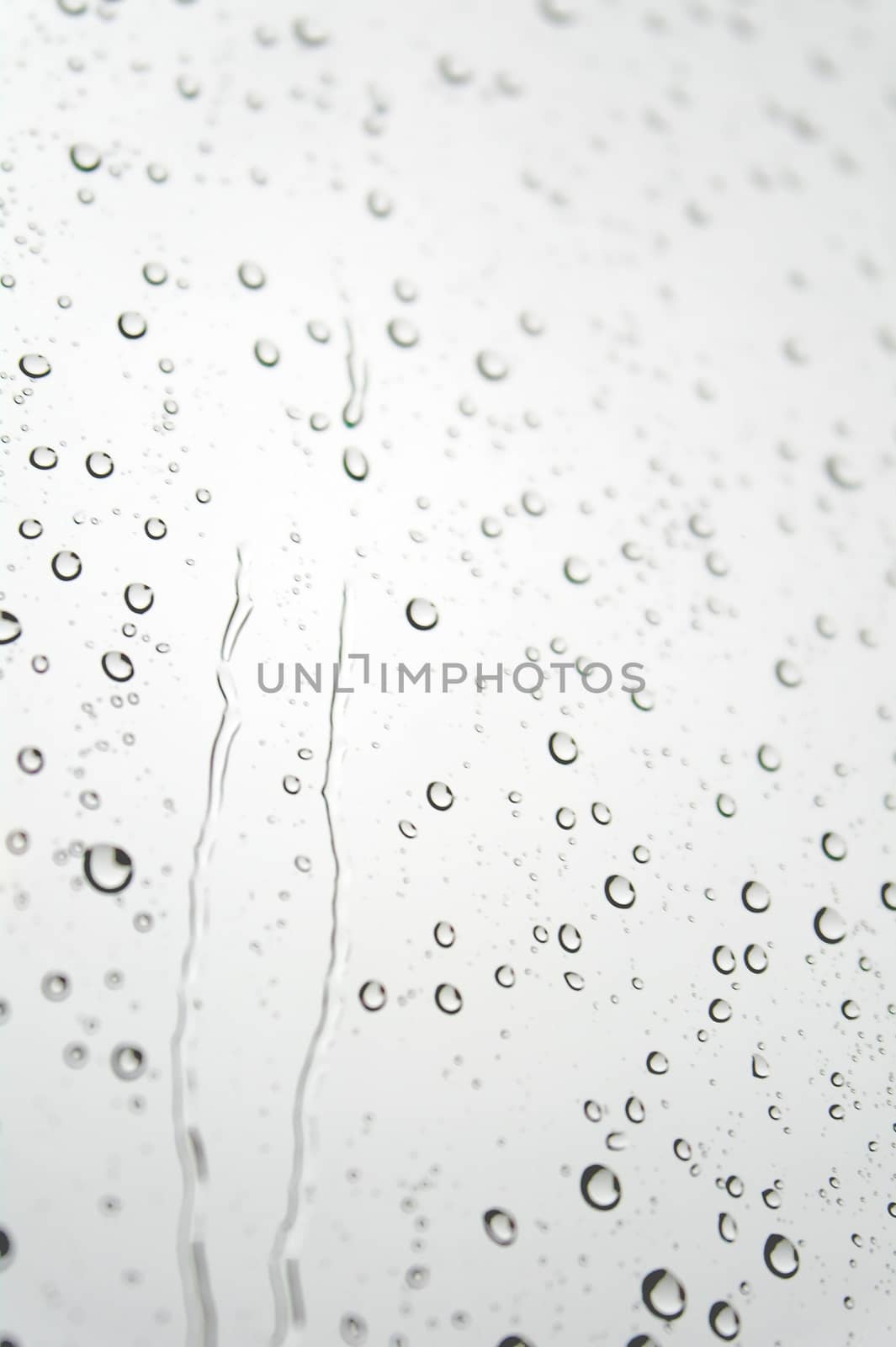 Drops of rain on the inclined window. Shallow DOF.