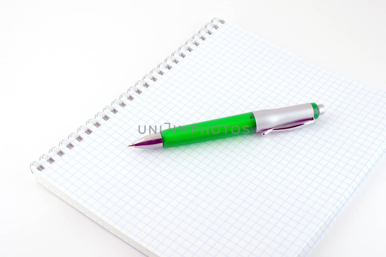 Green pen with copy-book