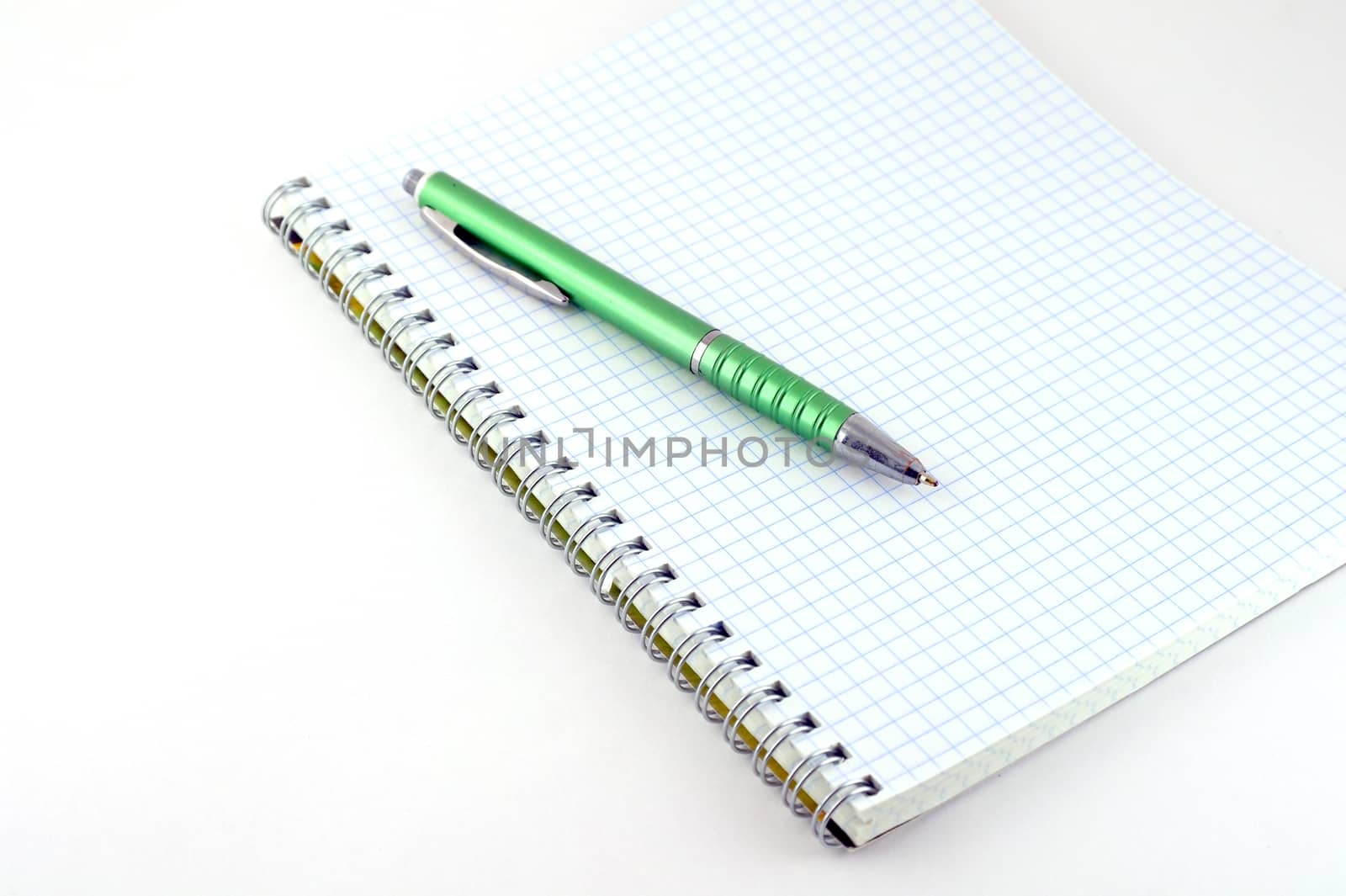 Green pen with copy-book