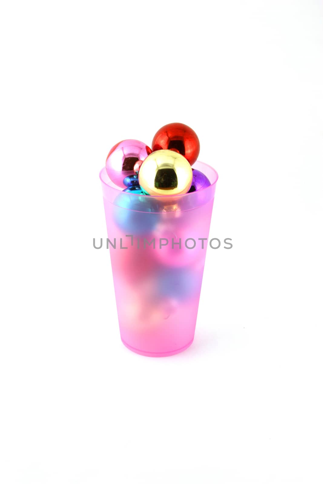 Color christmas decorations (balls) in cup