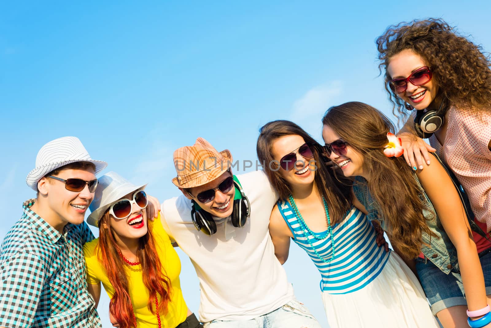 group of young people wearing sunglasses and hat by adam121