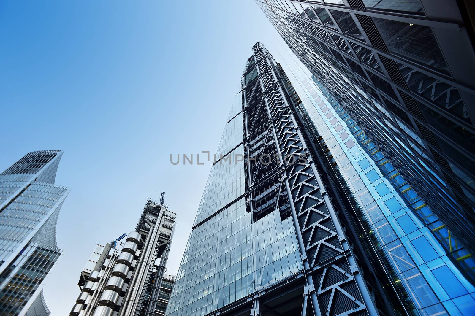 Low angle shot of modern glass city buildings