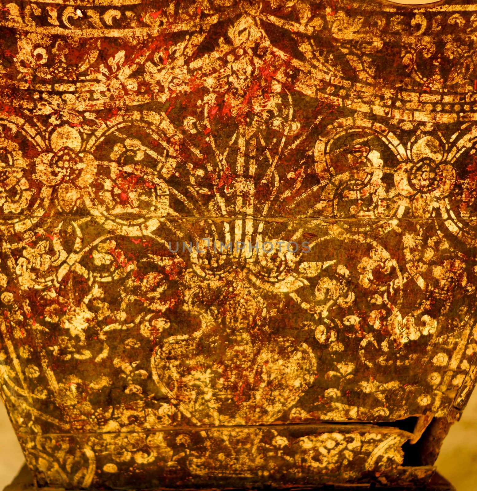 detail of traditional thai pattern that made by stitched gold leaf on wood plate,shallow focus