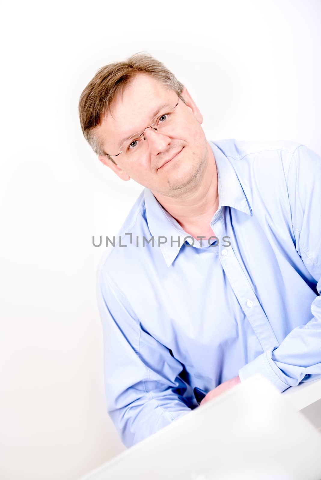 Man in glasses angled portrait
