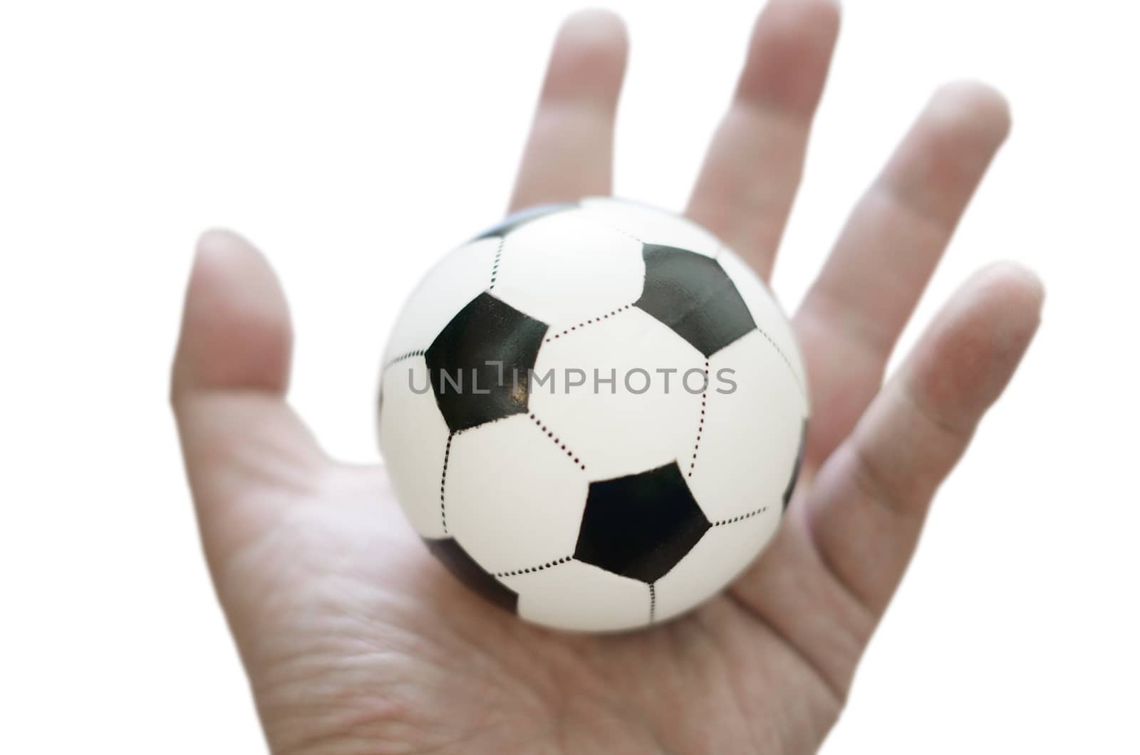 Football toy in hand isolated, In control concept