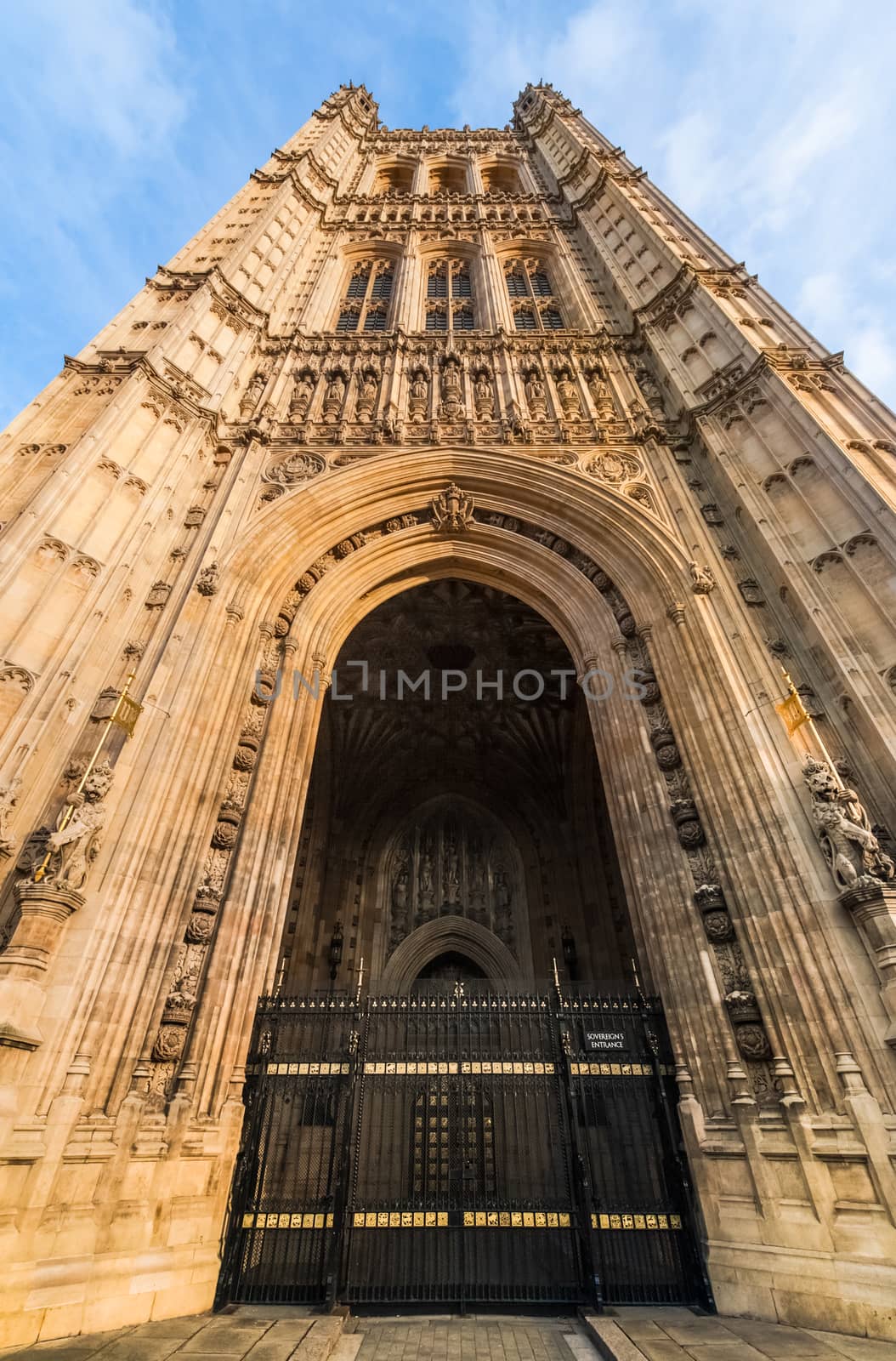 historic victoria tower landmark and sovereigns entrance to the british parliament buildings in london