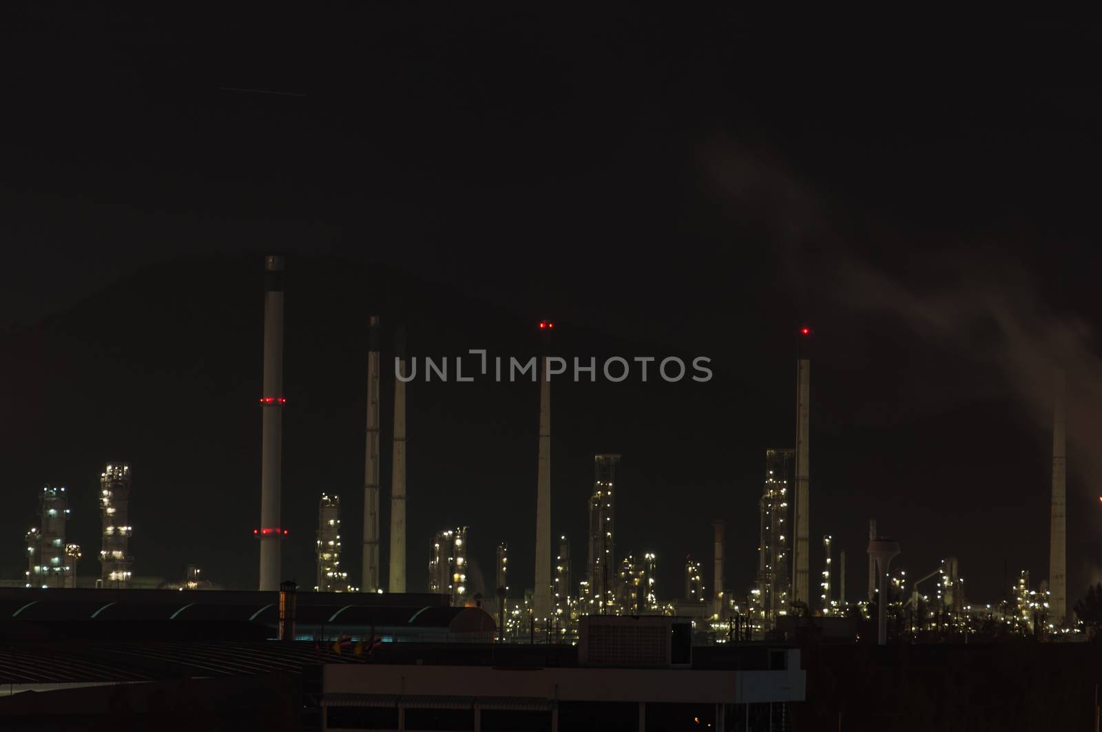 Oil refinery plant at dusk, power station