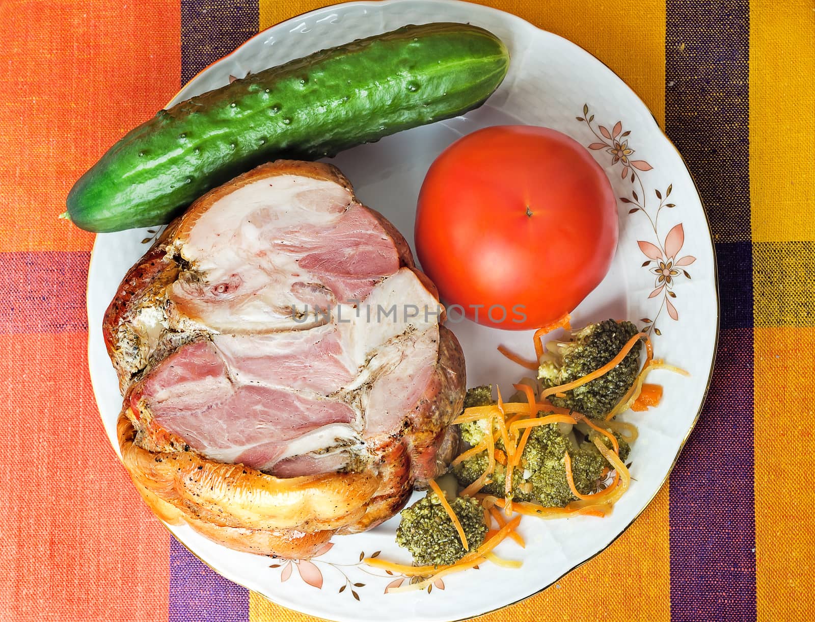 Smoked pork and vegetables on a white plate by georgina198
