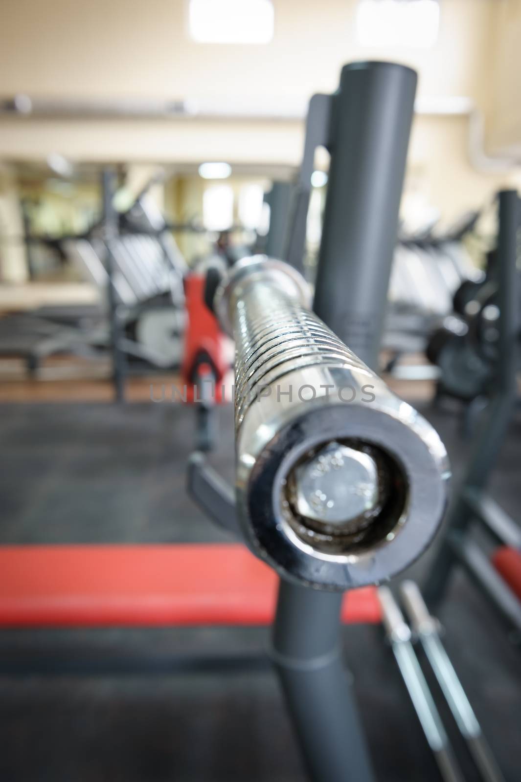 Empty barbell bar waiting to workout by starush