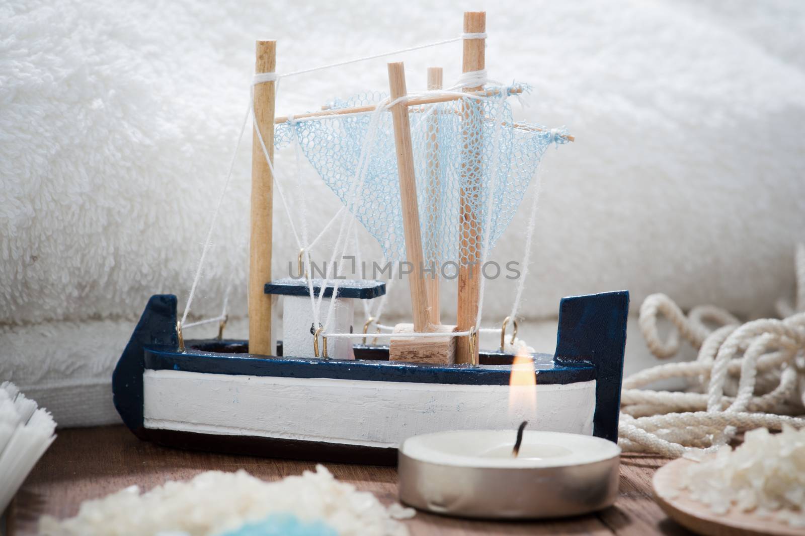 Bathroom Spa Set on wooden table with salt and candle 