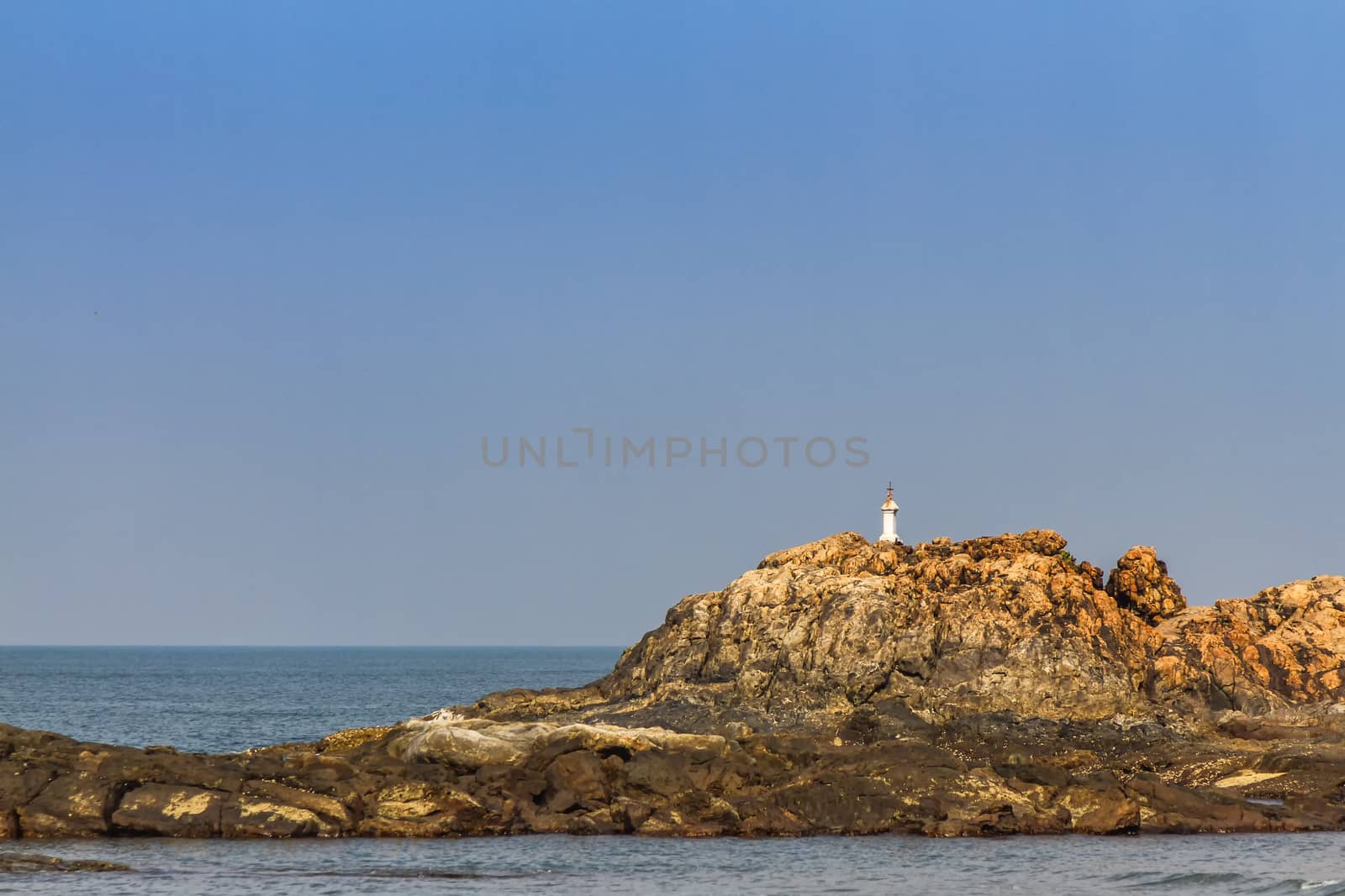View from beach in Goa to Arabian sea. Rock near sea