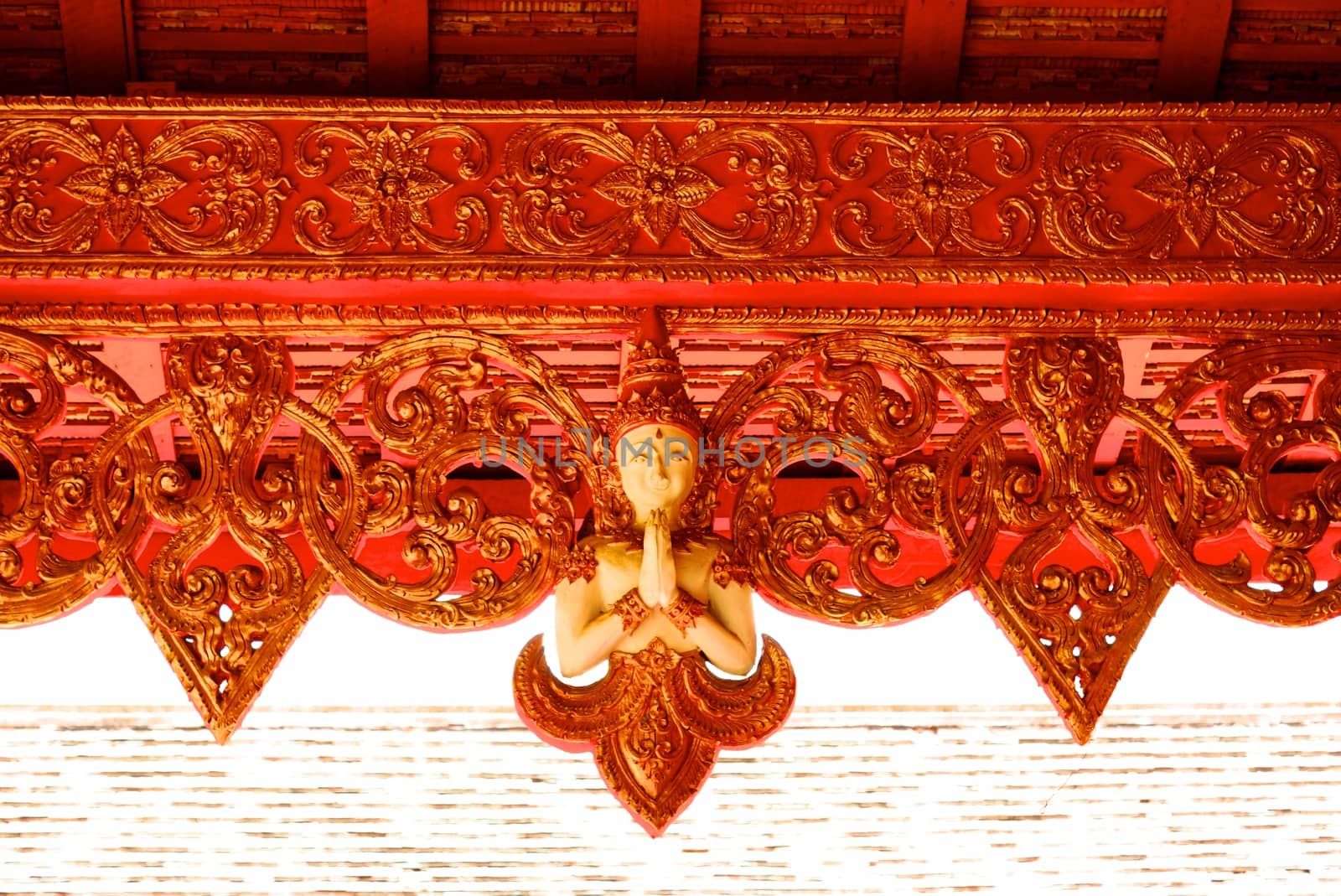 thai traditional angel sculpture mixing with thai pattern around pagoda,Lampang temple,Thailand