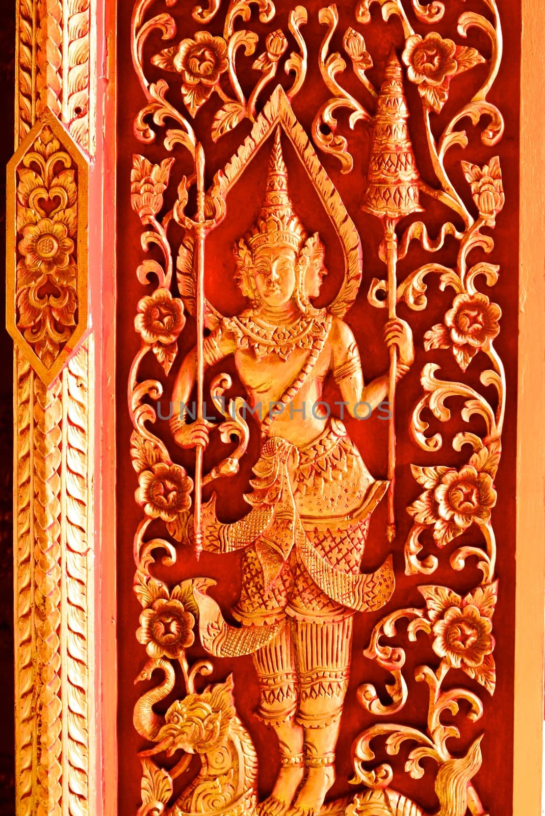 thai traditional angel sculpture mixing with thai pattern around pagoda,Lampang temple,Thailand