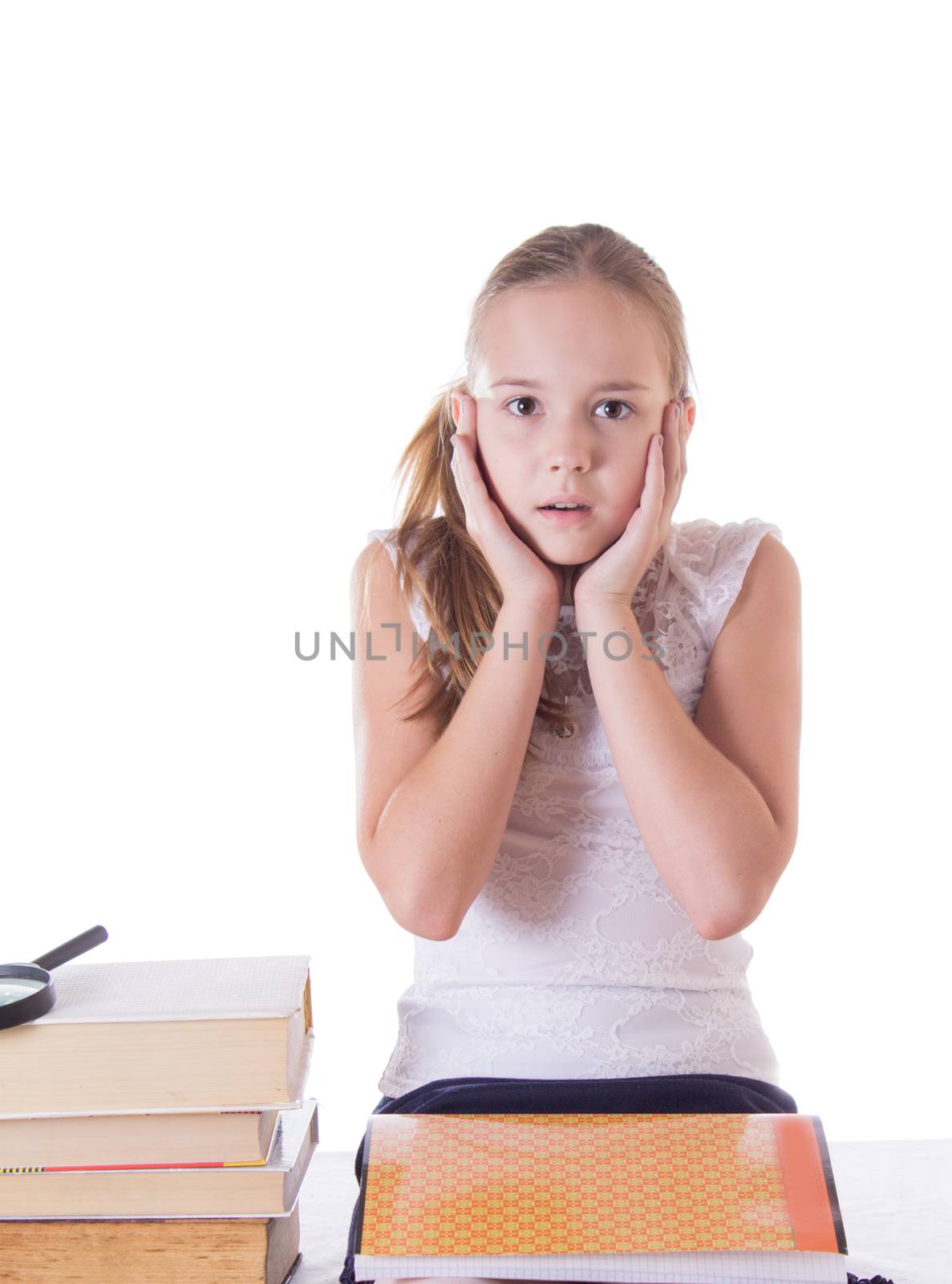 Horrified schoolgirl with pile of books isolated on white