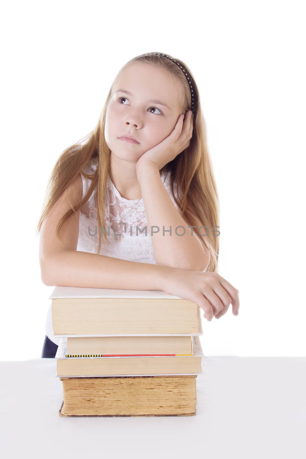 Thoughtful schoolgirl with pile of books by Angel_a