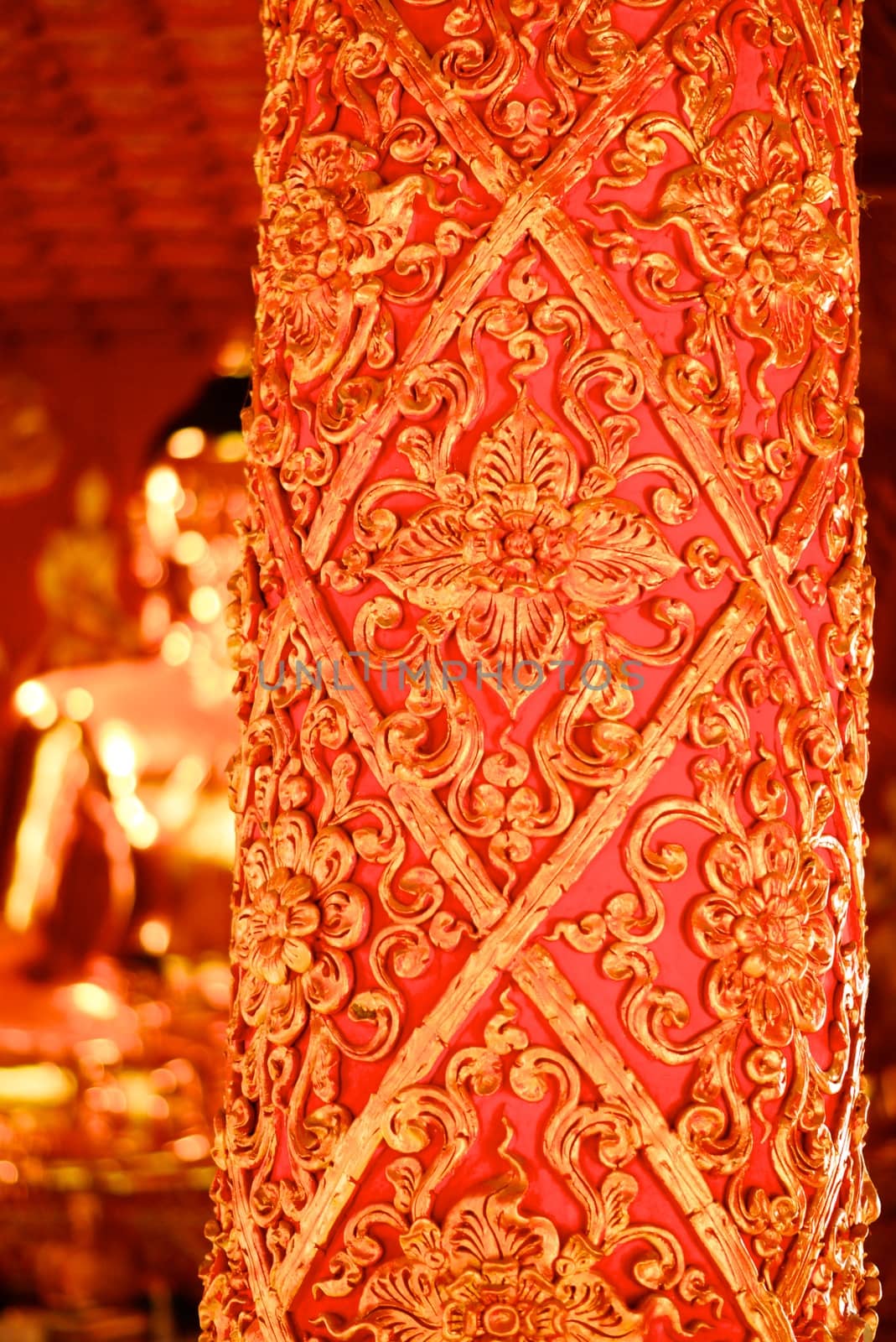 high complicated stucco work showing of traditional thai pattern that decorated with mirror and precious stone,Lampang temple,Thailand