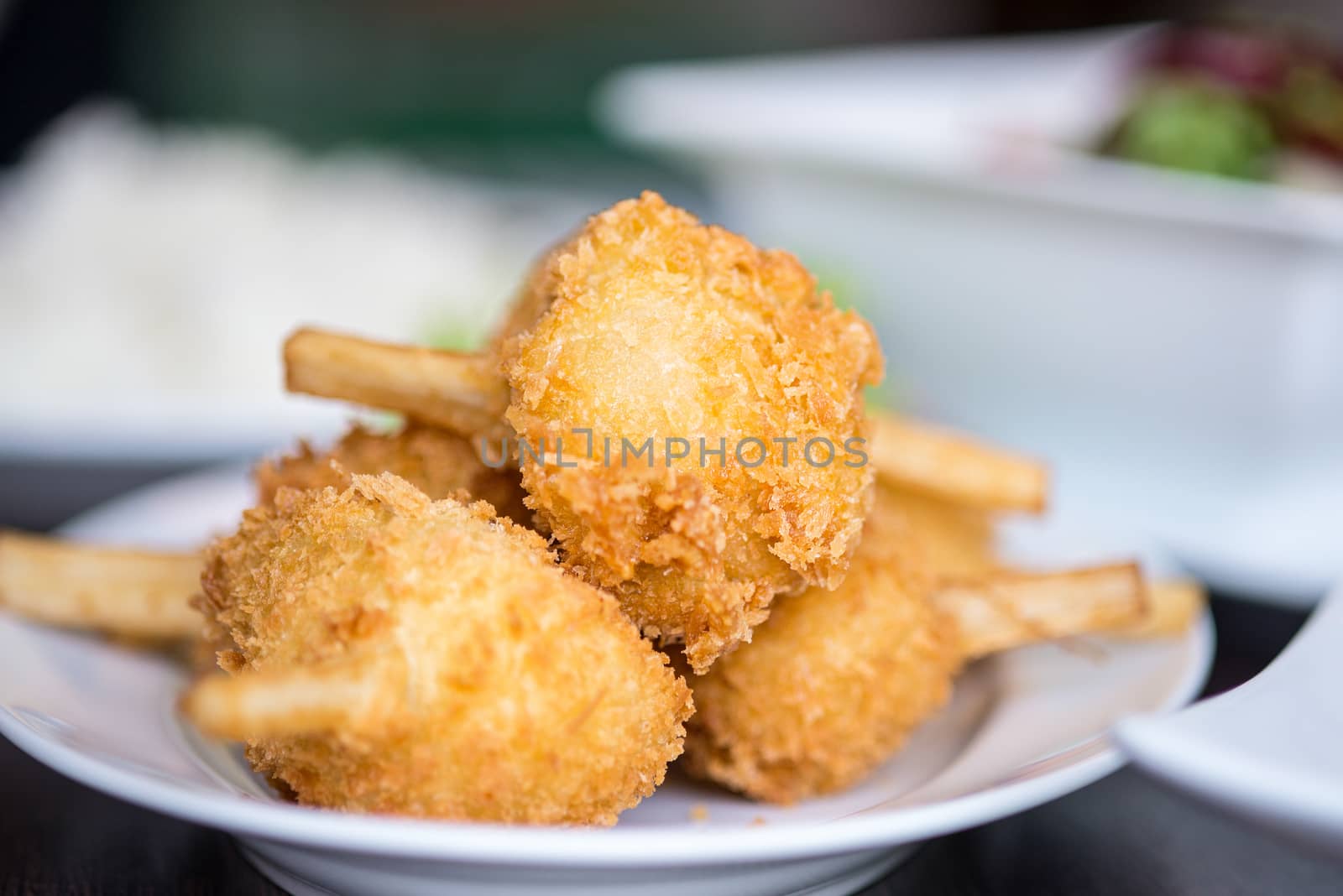 Sugar cane skewered fried minced shrimps or Chao tom - Vietnamese food