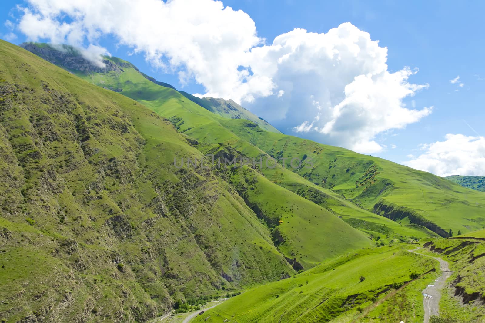 Summer landscape with Russian Caucasus green mountains