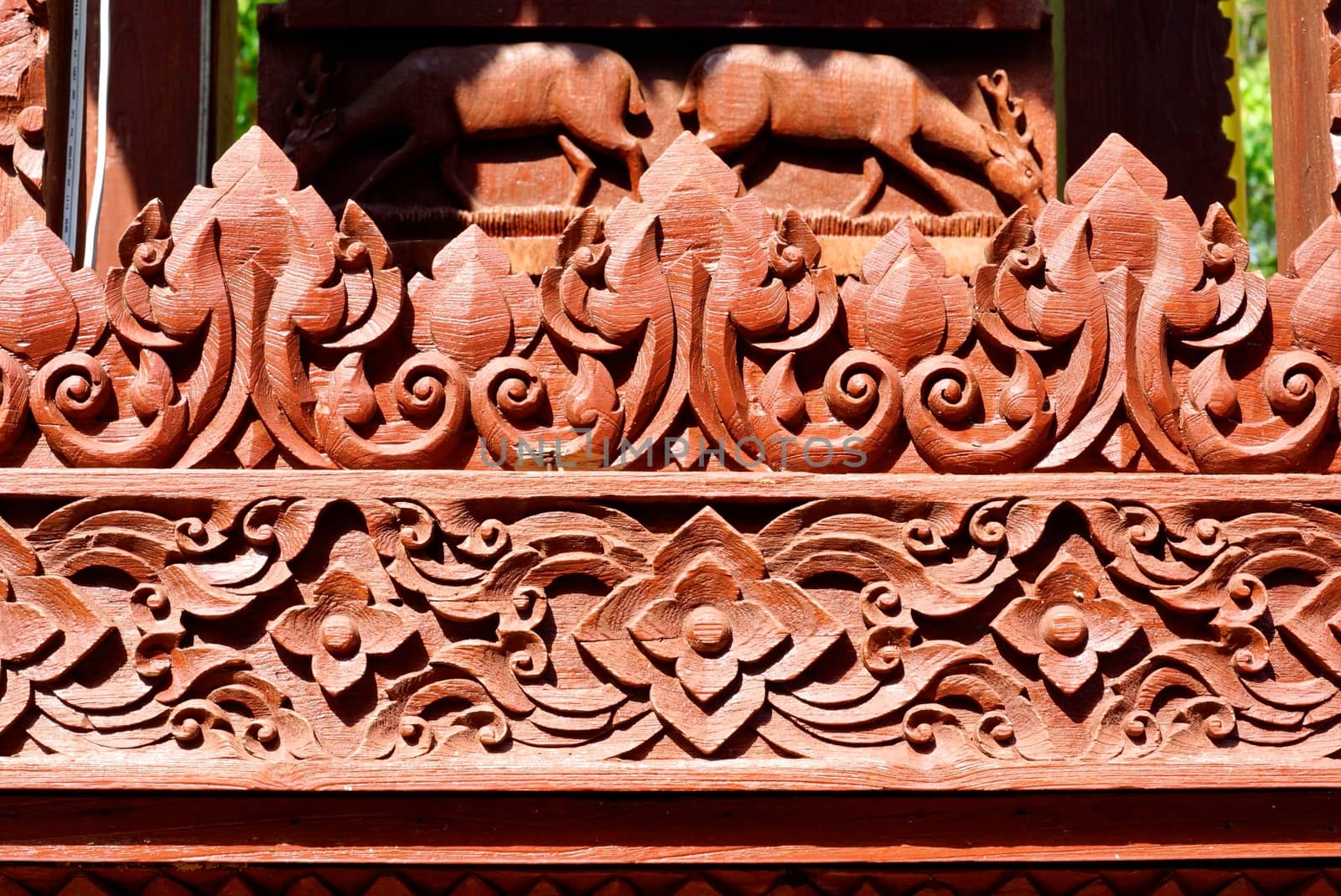 the detail of  handcraft wood carving for decorated temple,showing of thai pattern,Lampang temple,Thailand