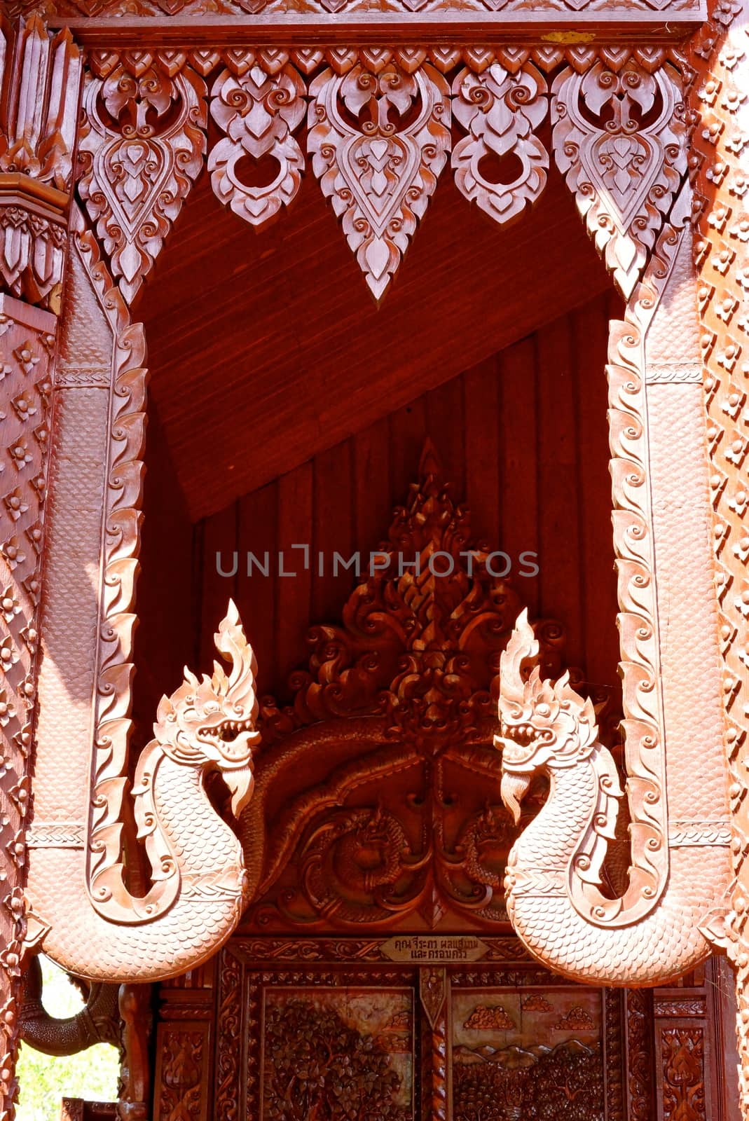 the detail of  handcraft wood carving for decorated temple,showing of thai pattern,Lampang temple,Thailand