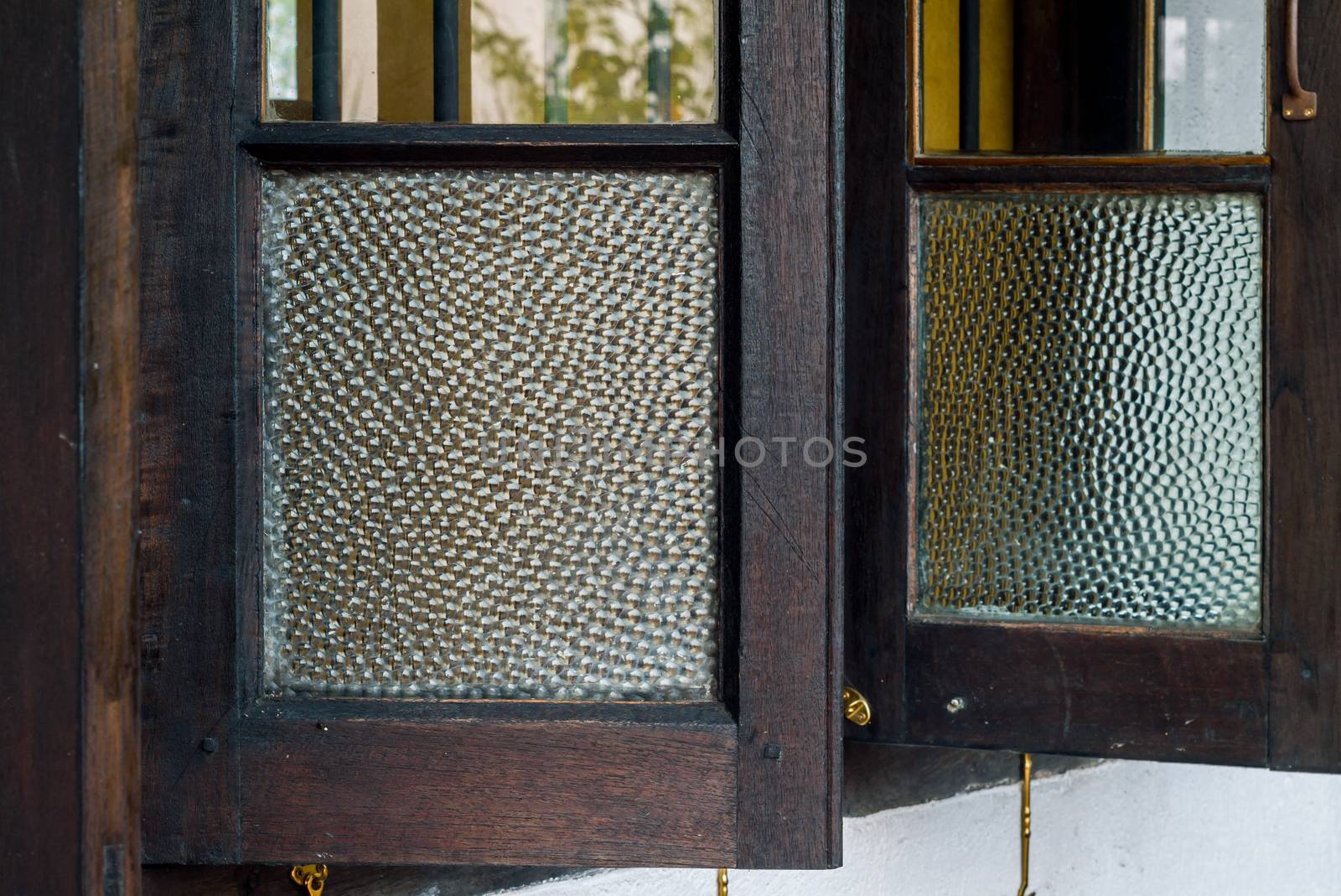 Old wooden window with old frosted glass